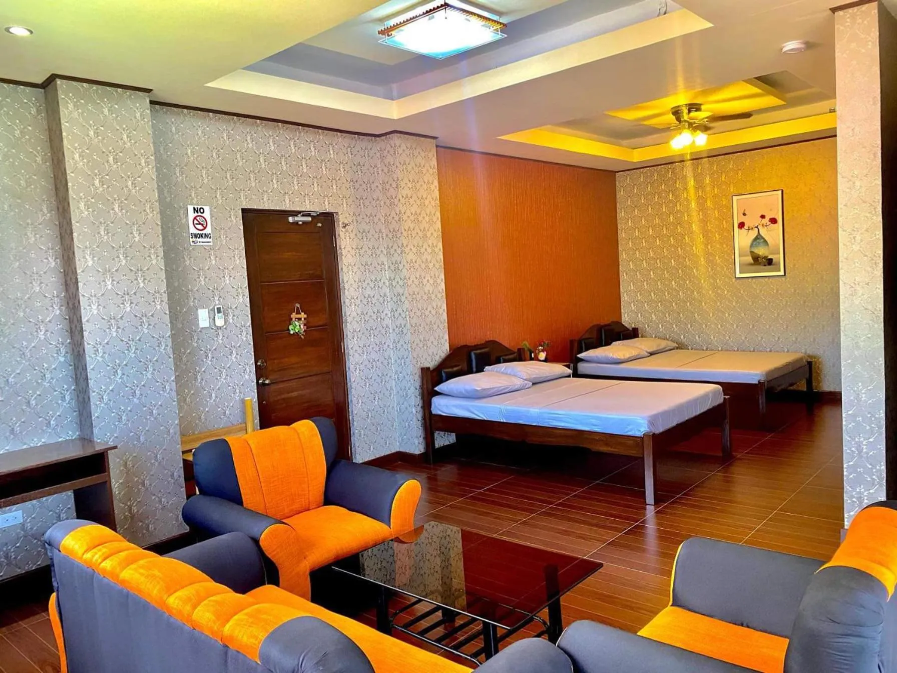 Photo of the whole room, Bed in MinshukuKCS Hotel and Restaurant