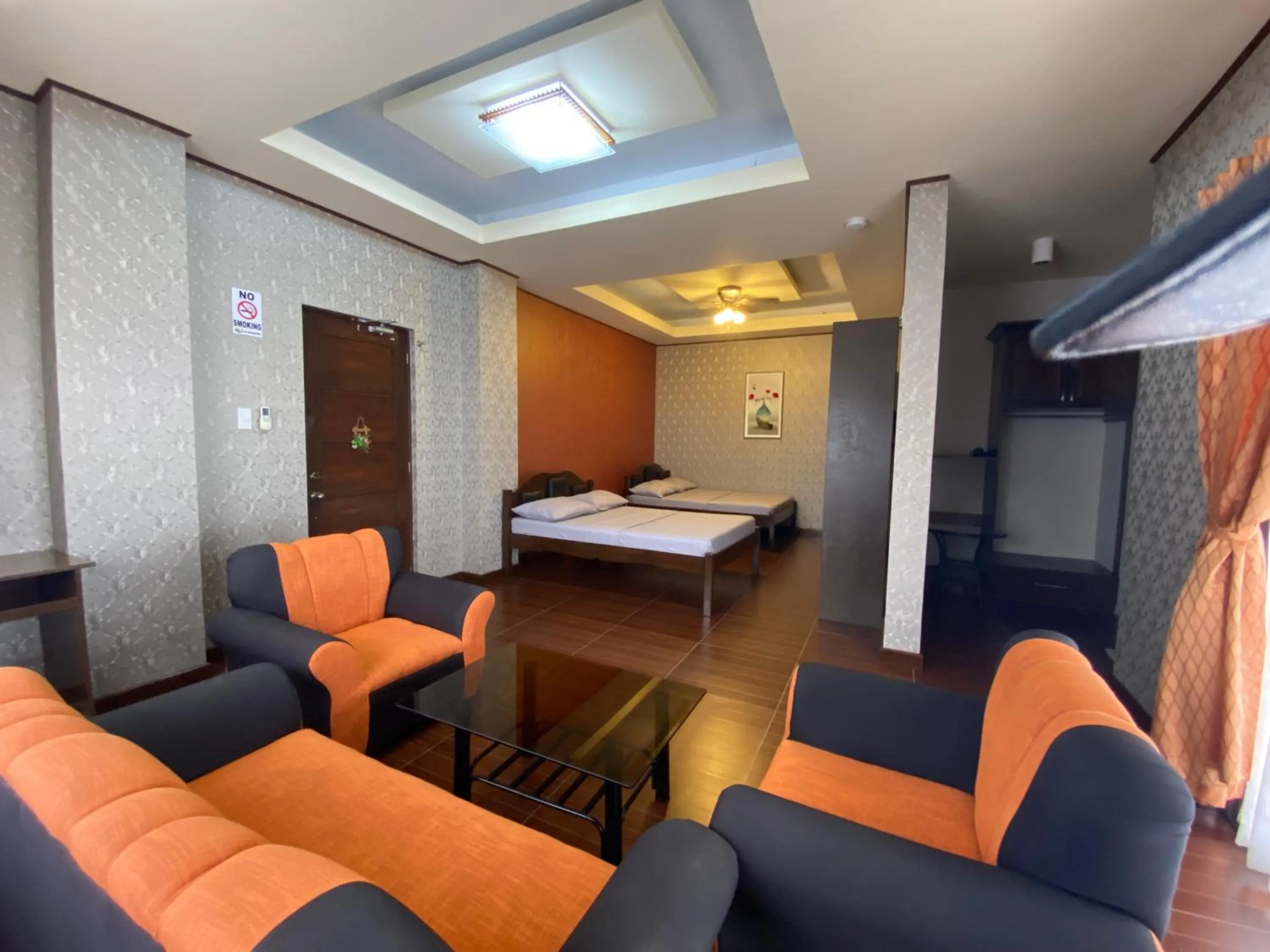 Photo of the whole room, Bed in MinshukuKCS Hotel and Restaurant