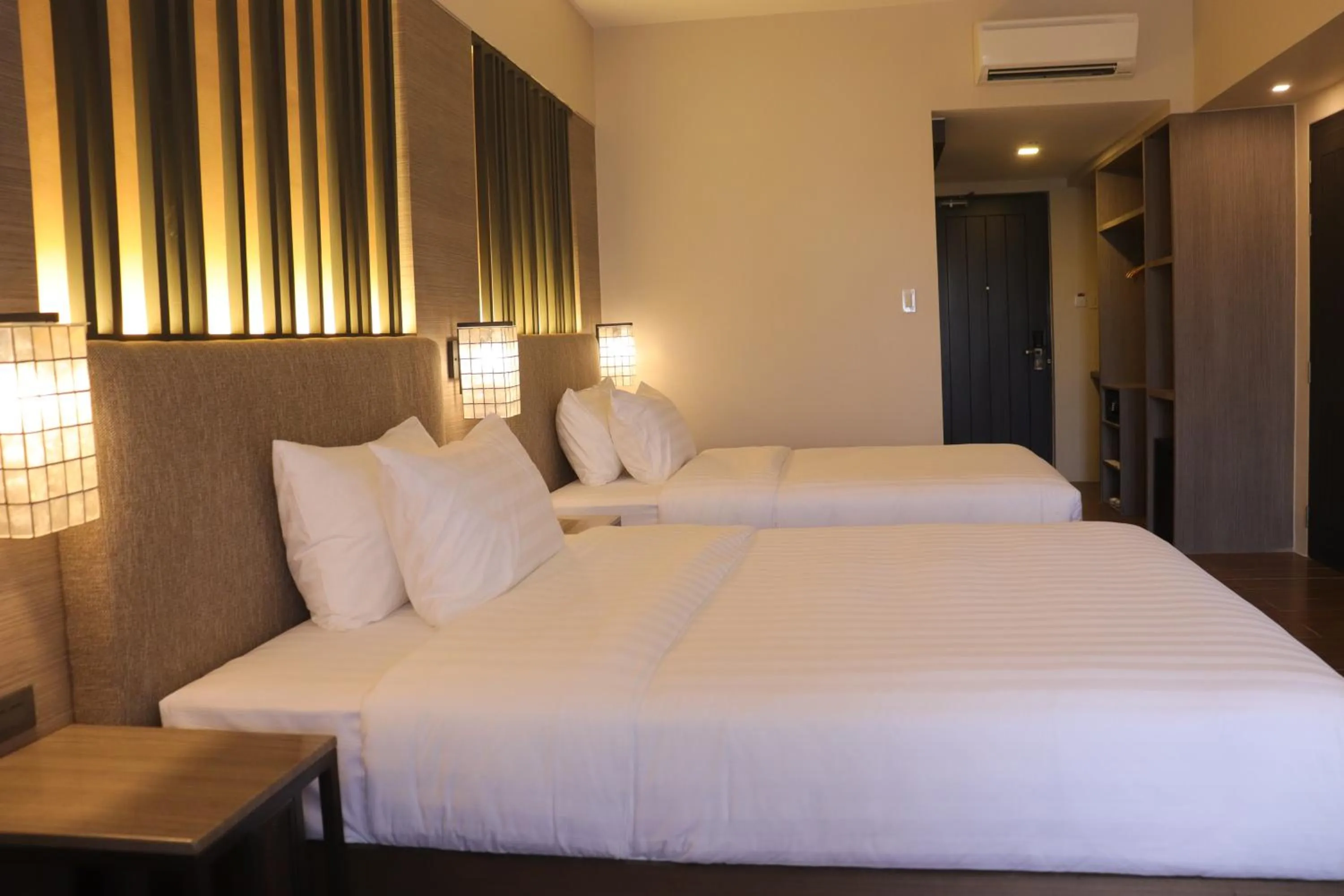 Bed in The Aurora Subic Hotel Managed By HII