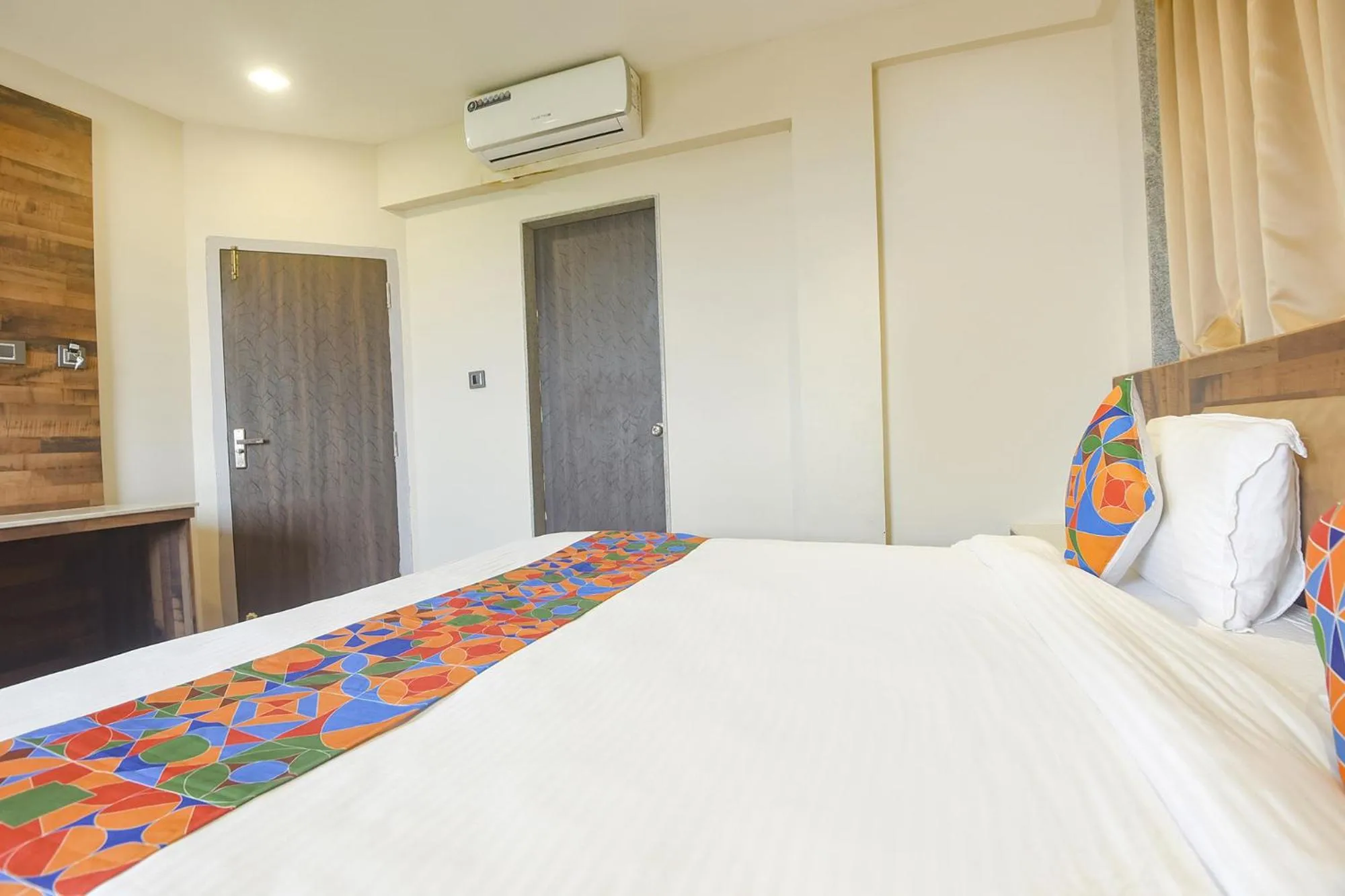 Bed in FabHotel Avasa Grand - Nr Big Daddy Casino