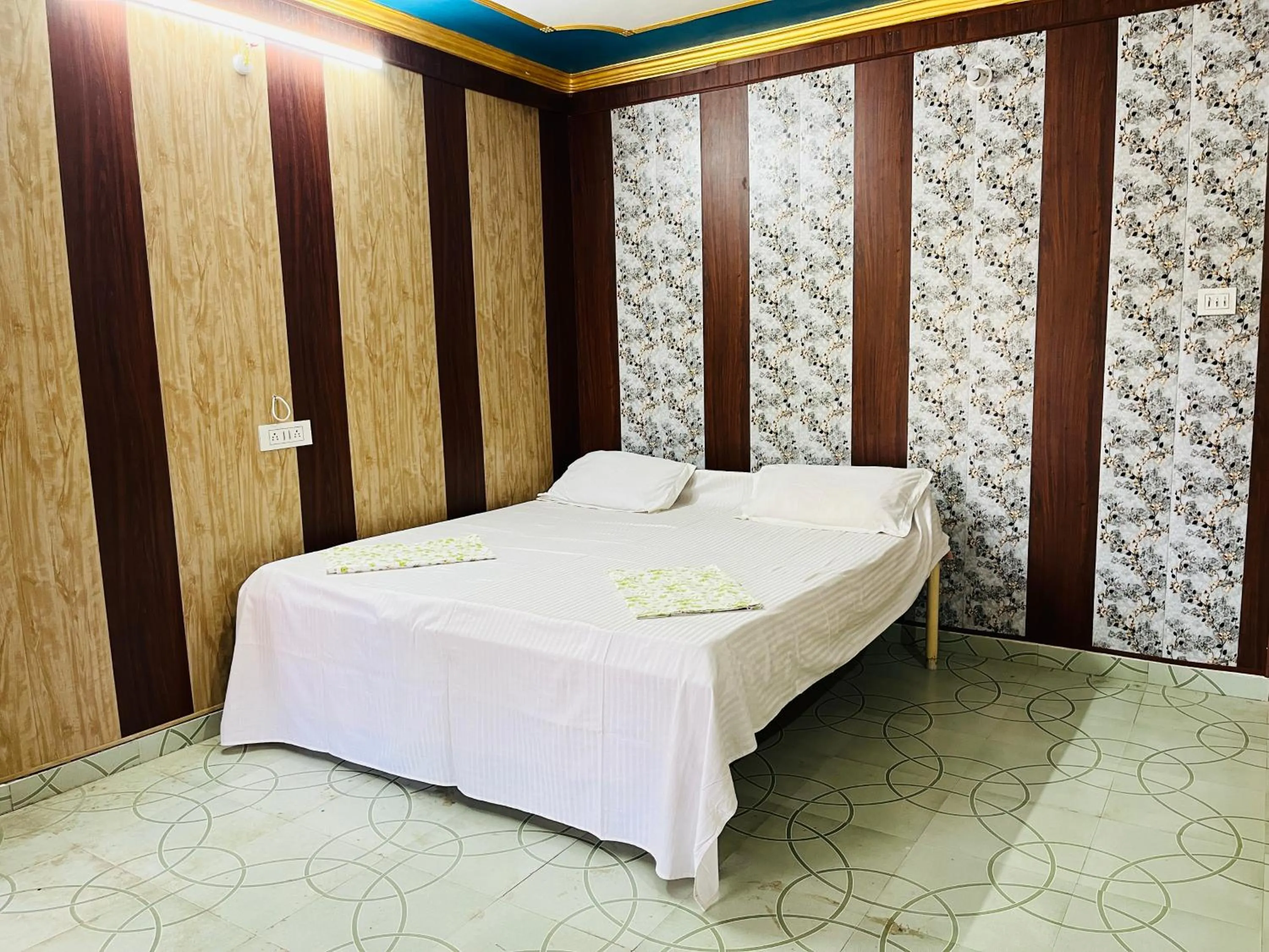 Bed in Maharastra Bhavan Atithi Grah