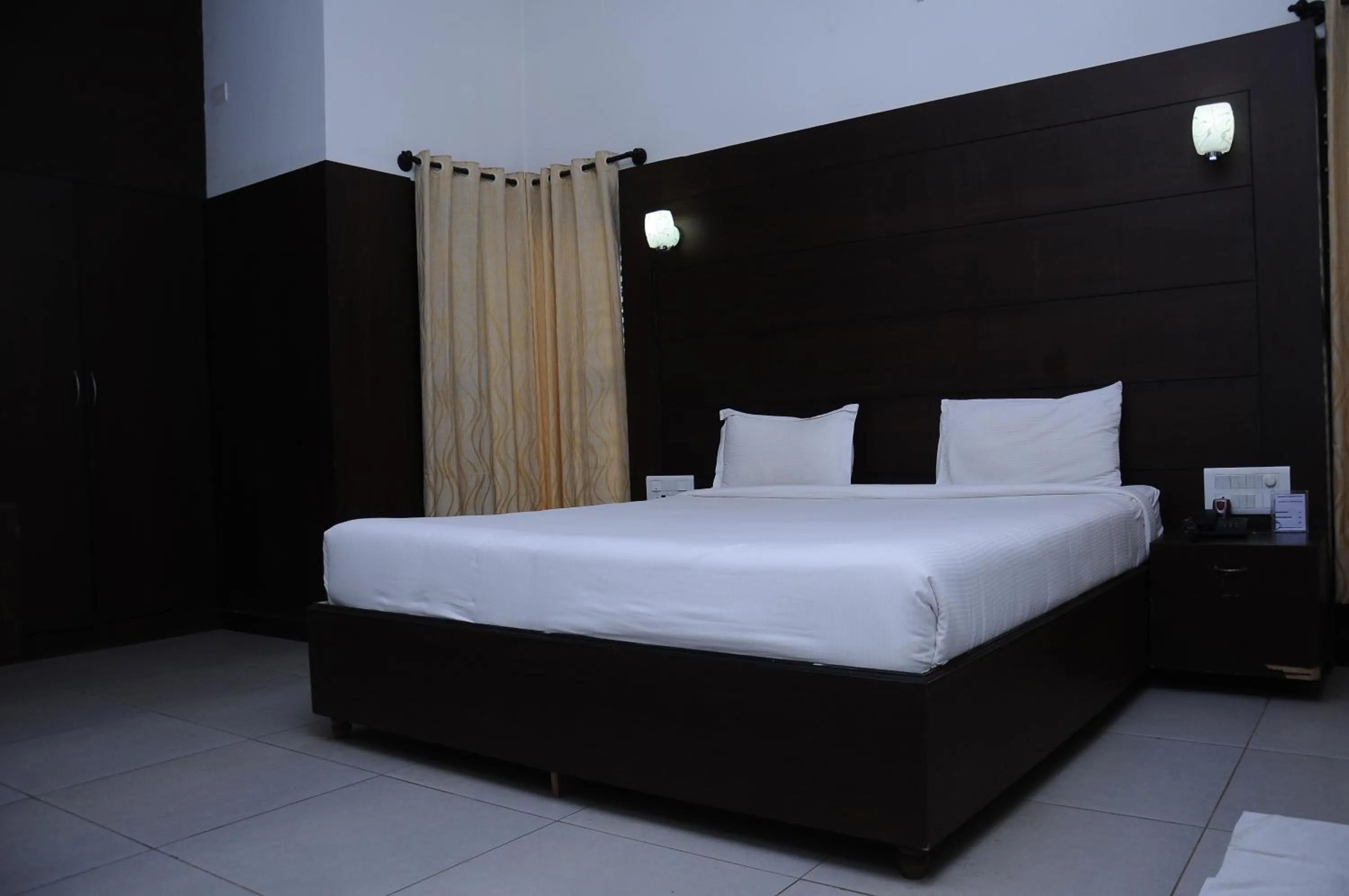 Bed in Nijaguna Residency