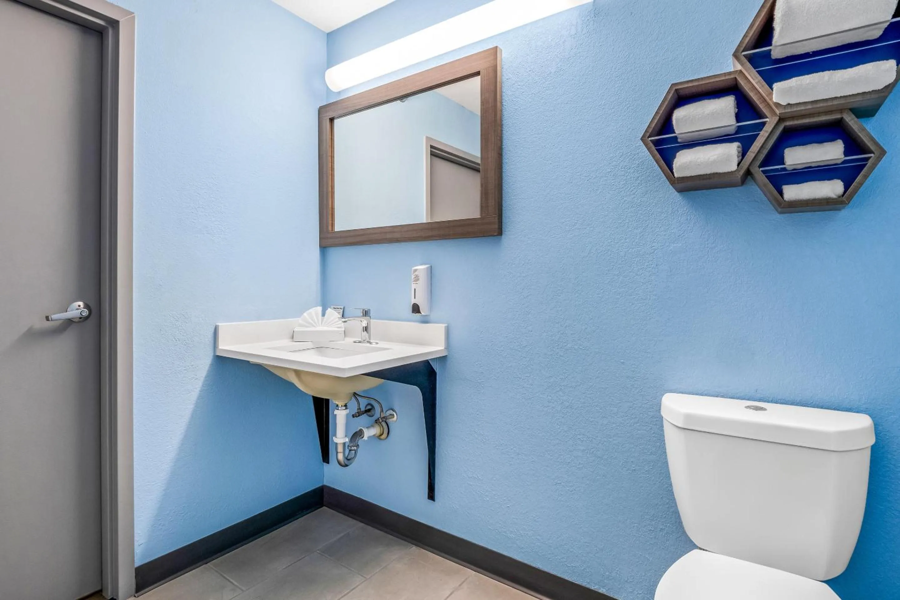 Bathroom in HomeTowne Studios by Red Roof Southfield