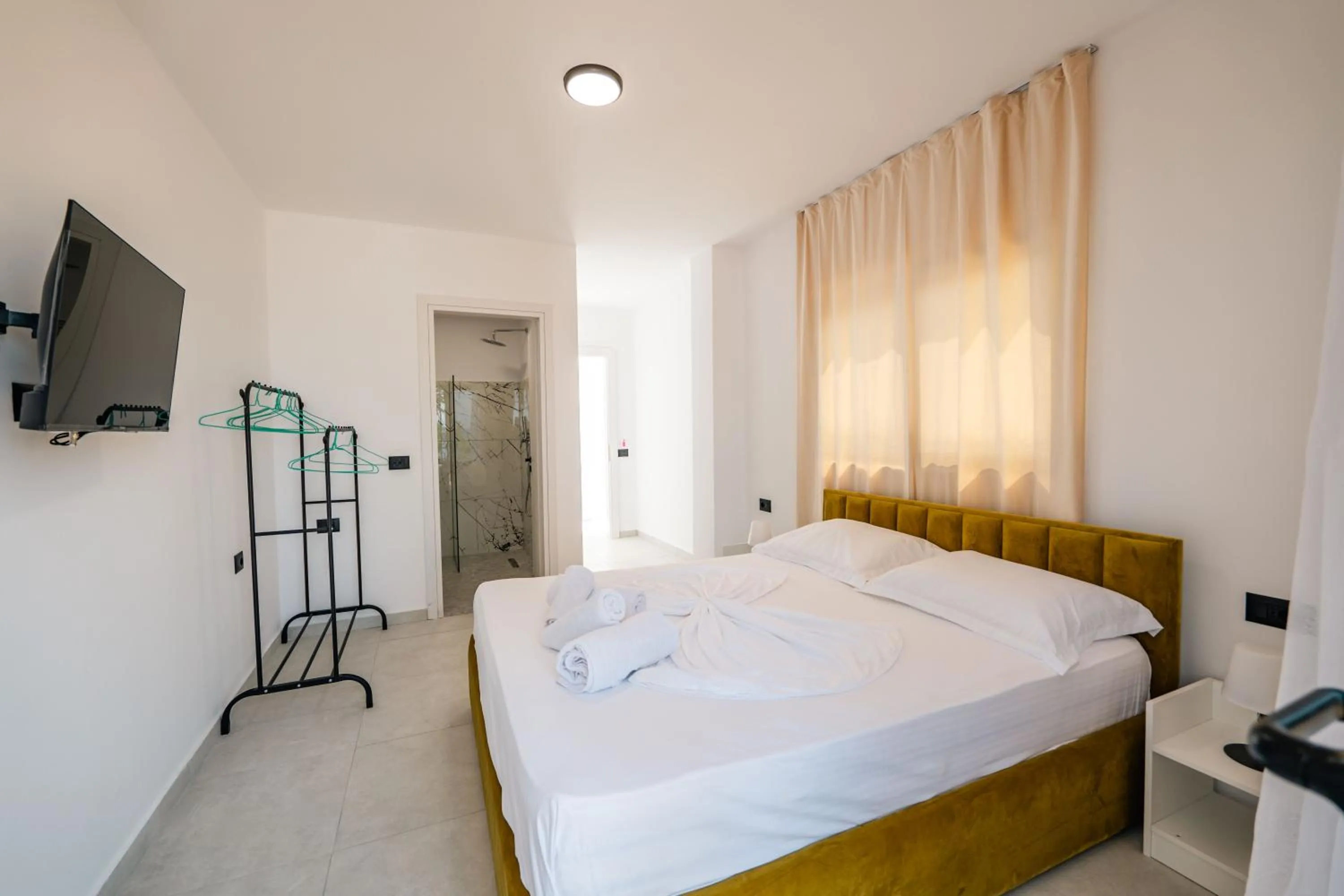 Bed in Sunset Aparthotel