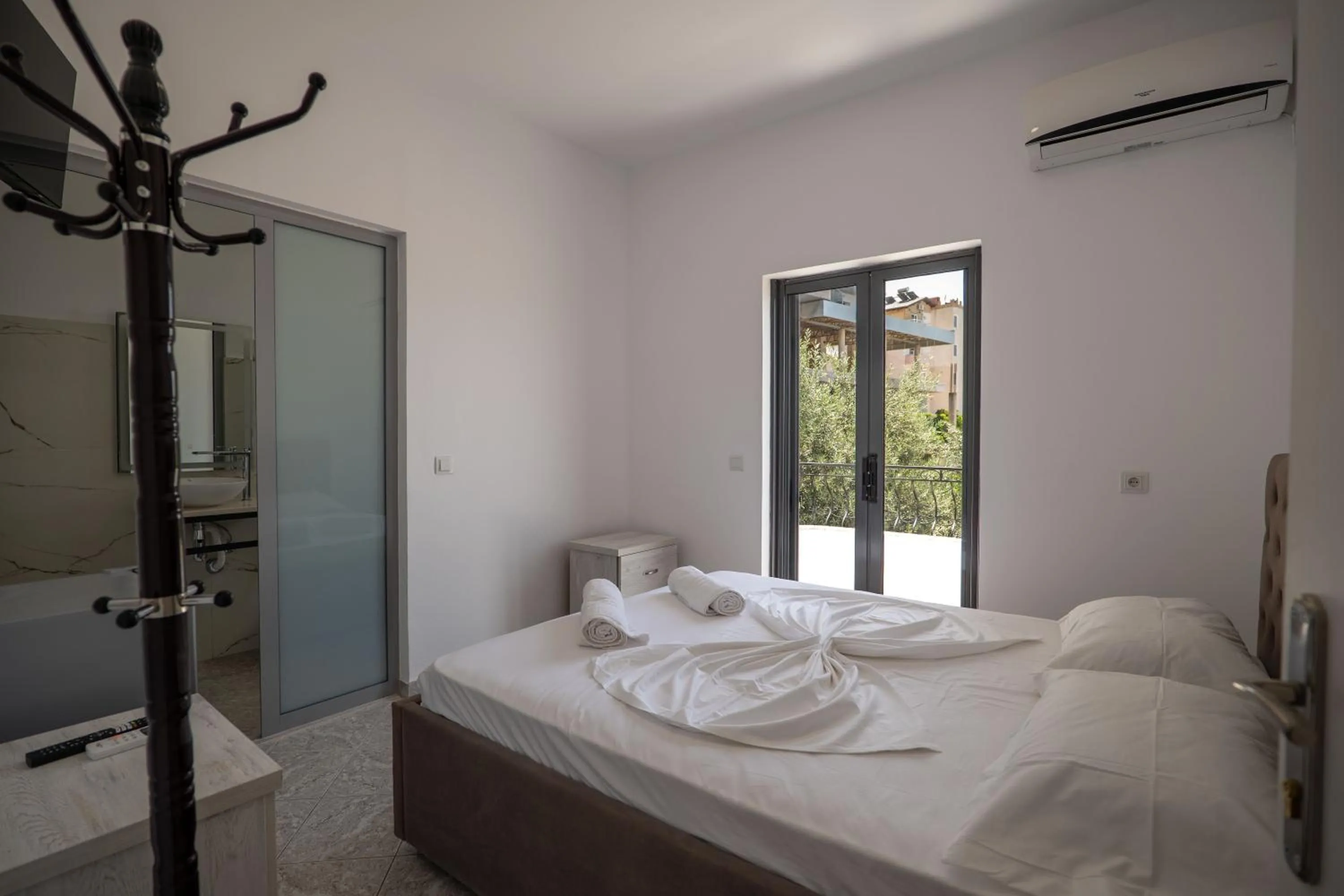 Bed in Sunset Aparthotel