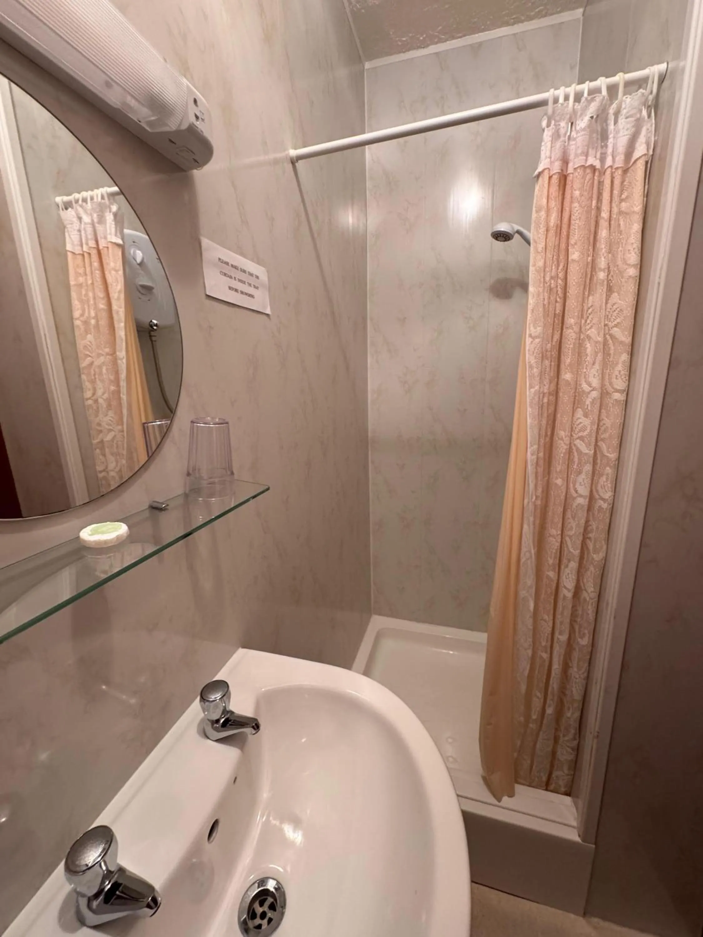 Bathroom in OYO Delton Hotel Blackpool Pleasure Beach