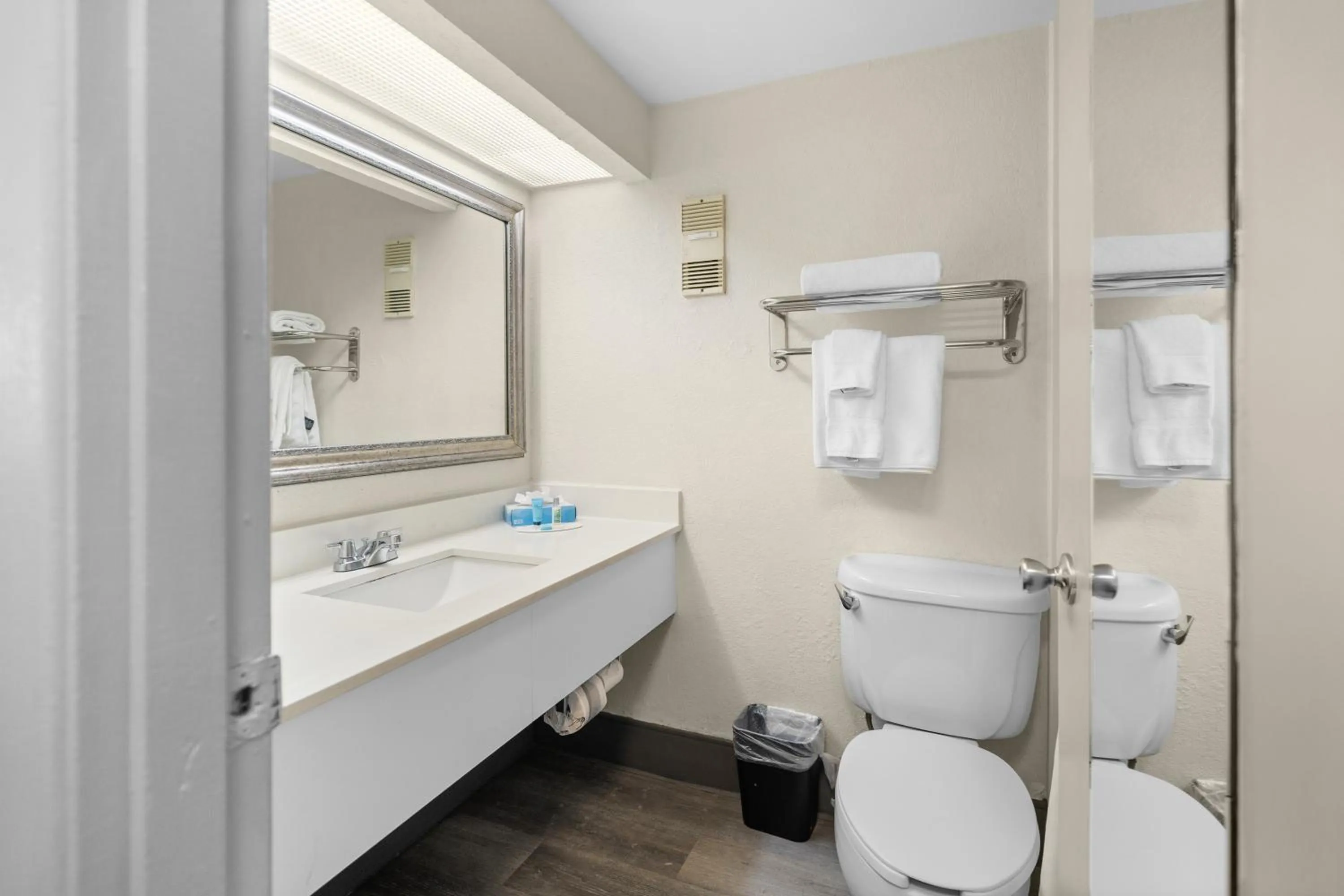 Toilet in 88 Palms Hotel & Event Center