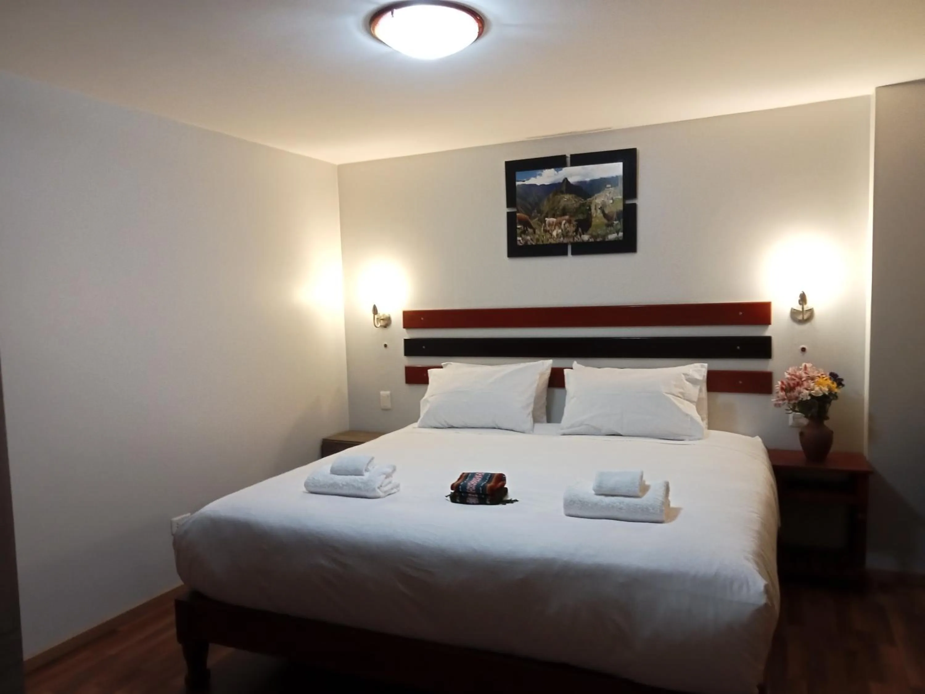 Bed in Raymi Inn MachuPicchu