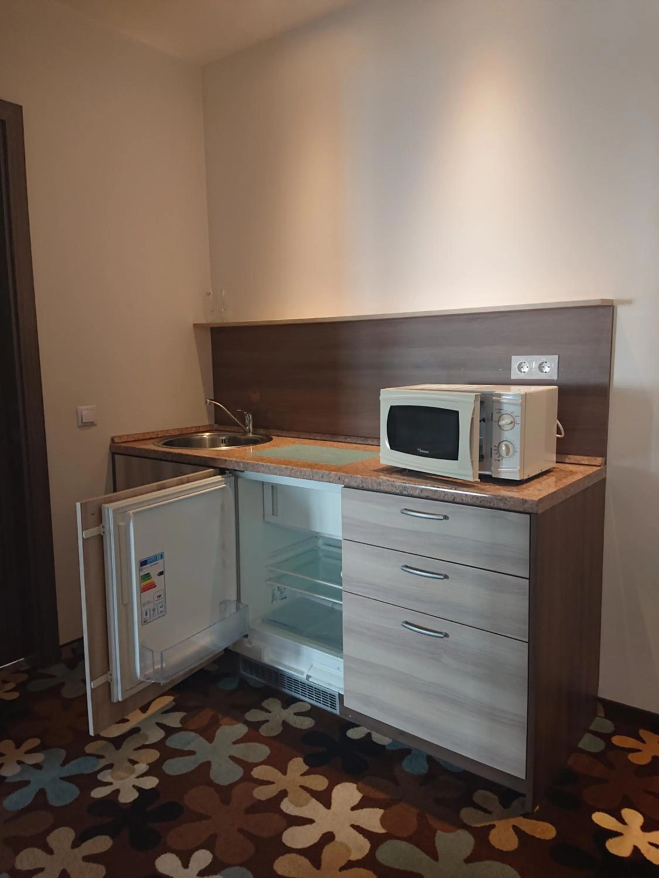 Kitchen or kitchenette in Algiro Hotel