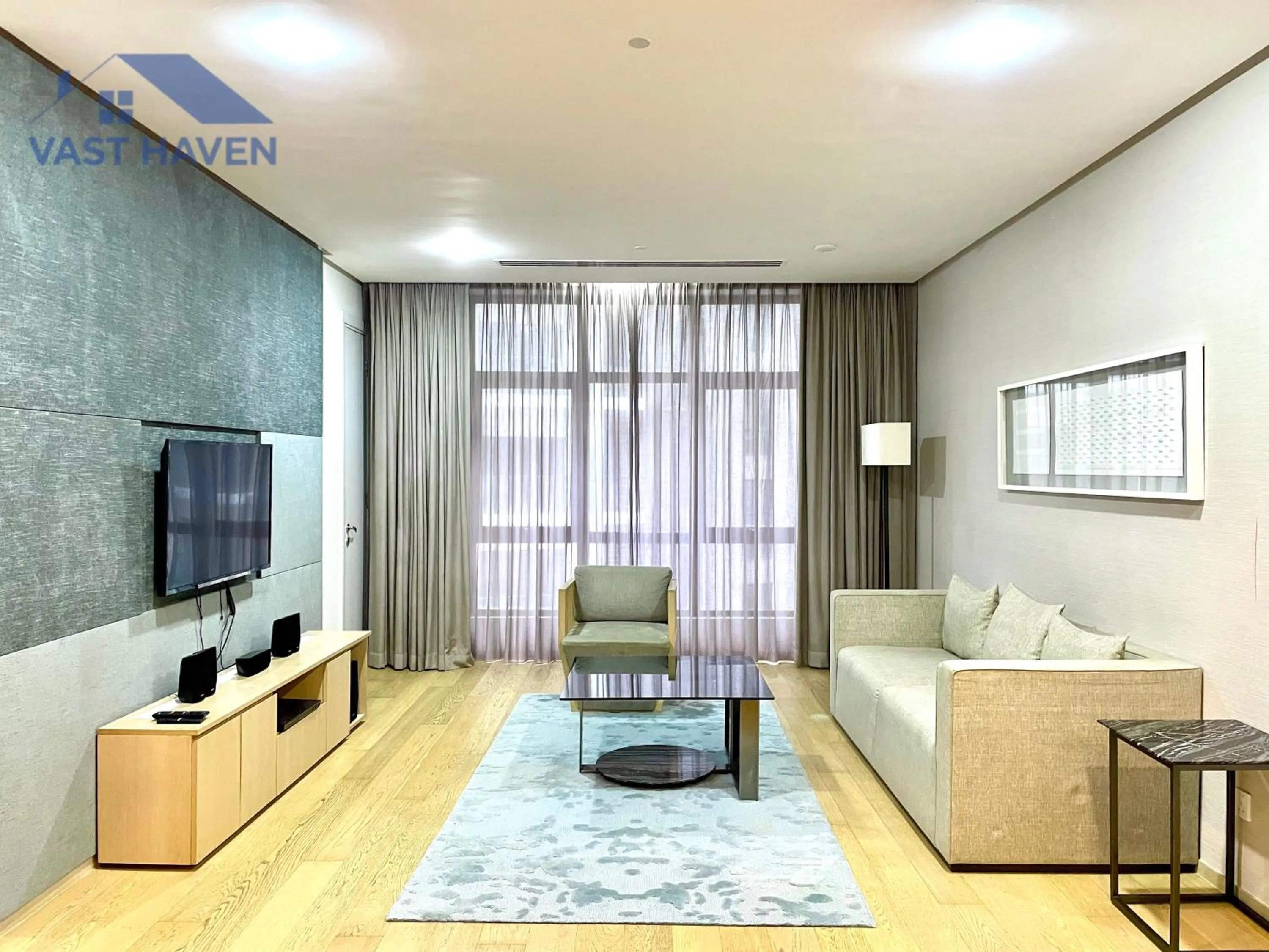 Communal lounge/ TV room in 188 Suites KLCC by VastHaven