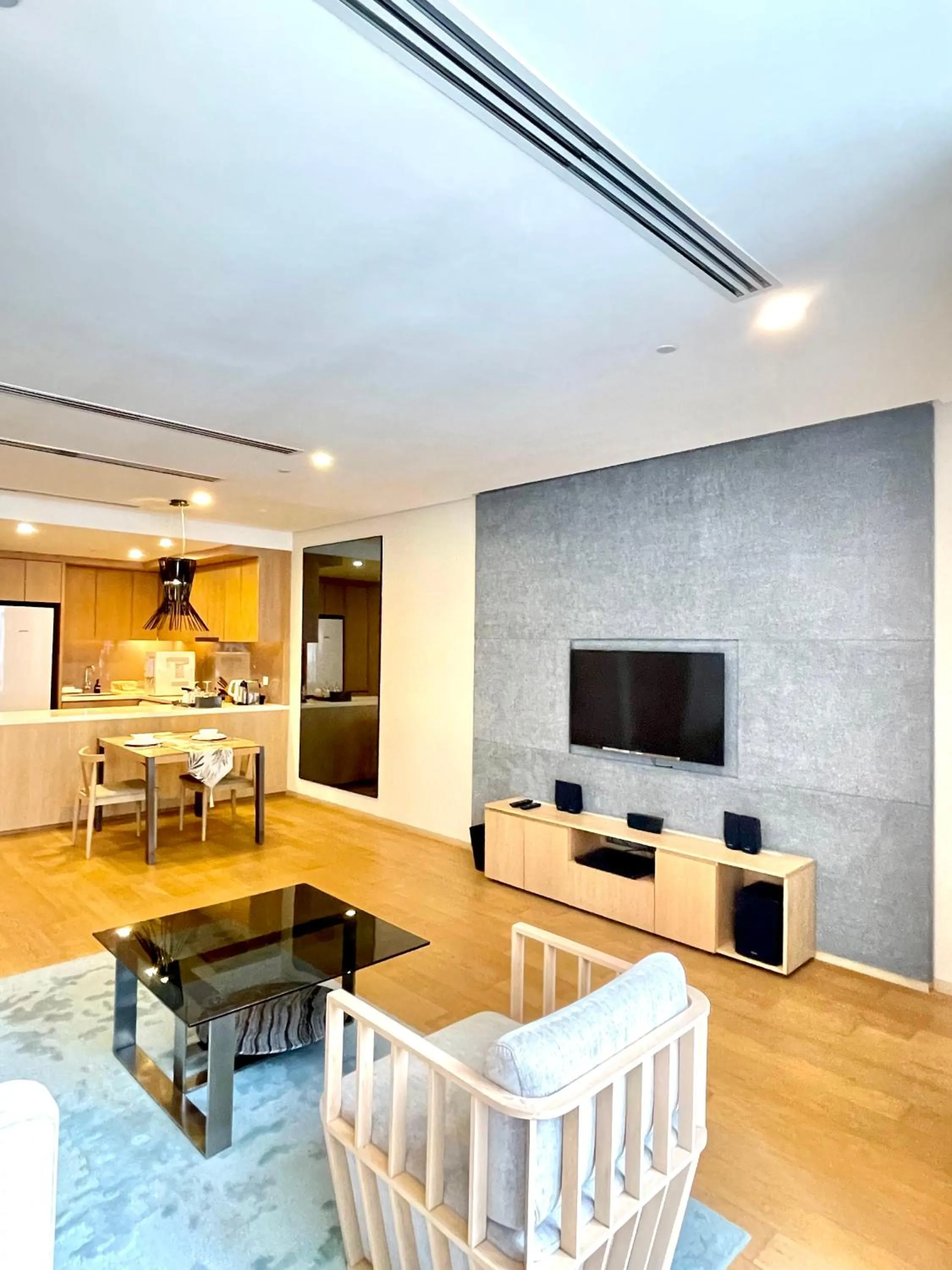 Communal lounge/ TV room in 188 Suites KLCC by VastHaven