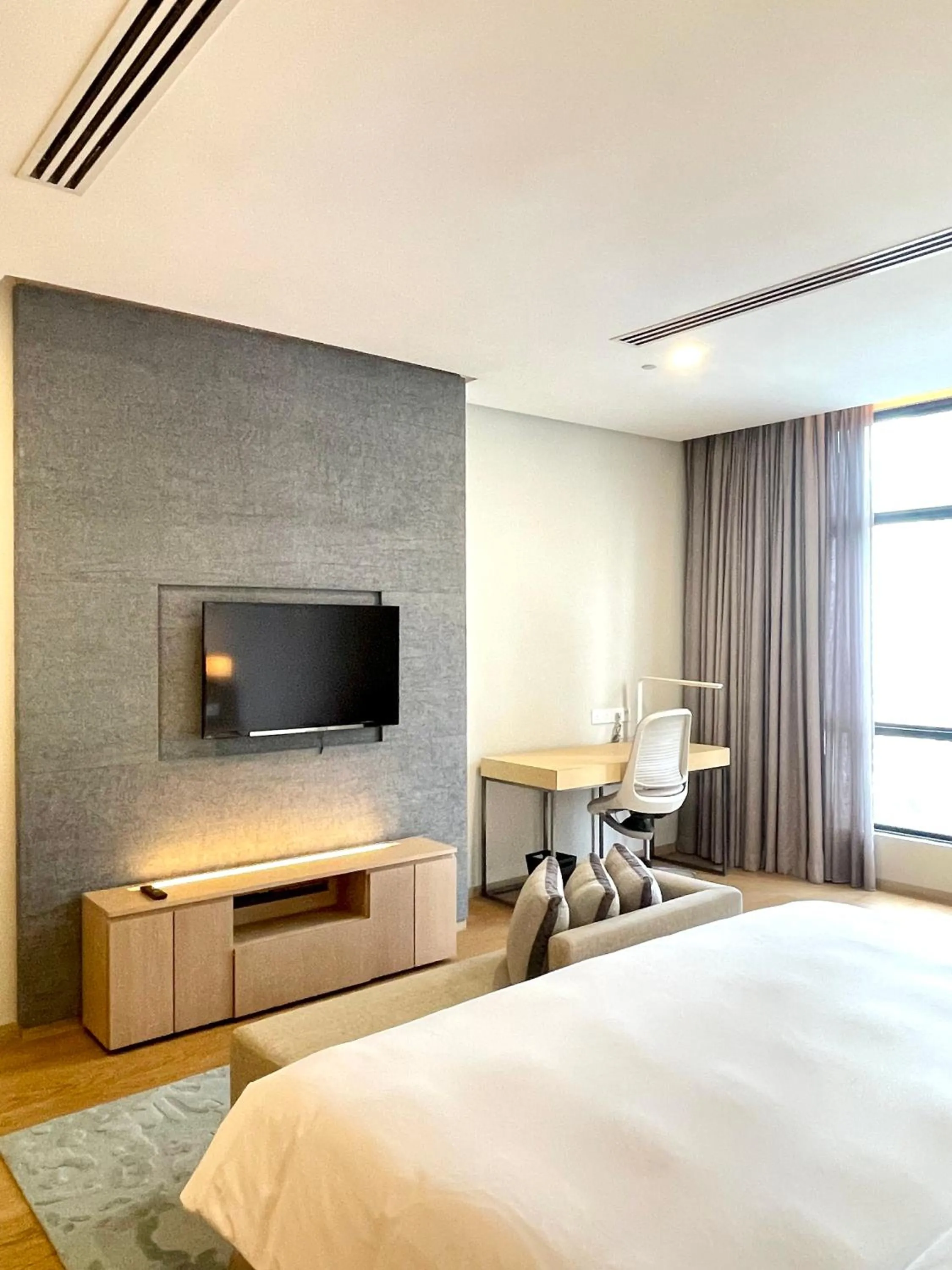 Communal lounge/ TV room, Bed in 188 Suites KLCC by VastHaven