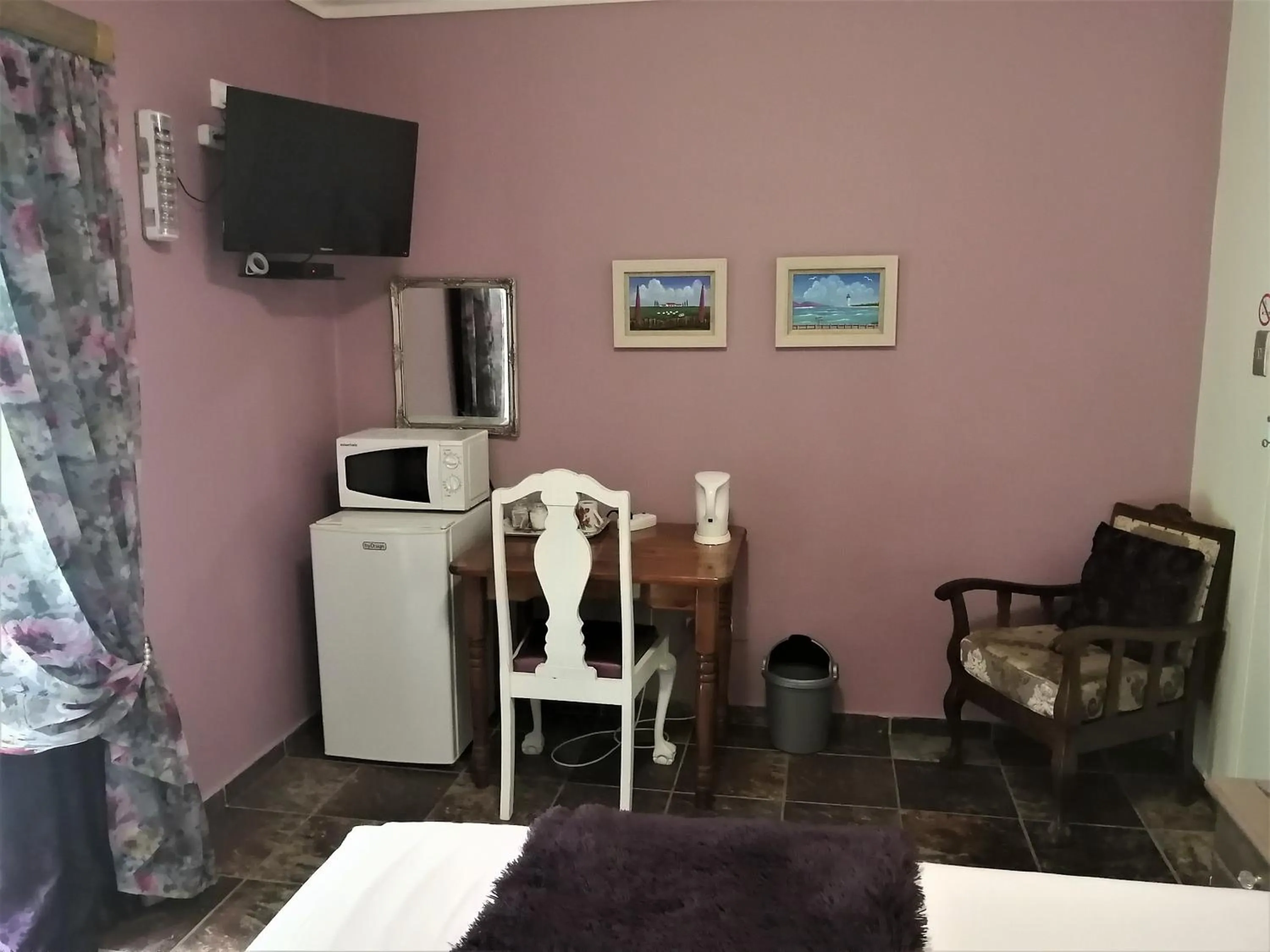 Seating area, Bed in Blessings Guesthouse