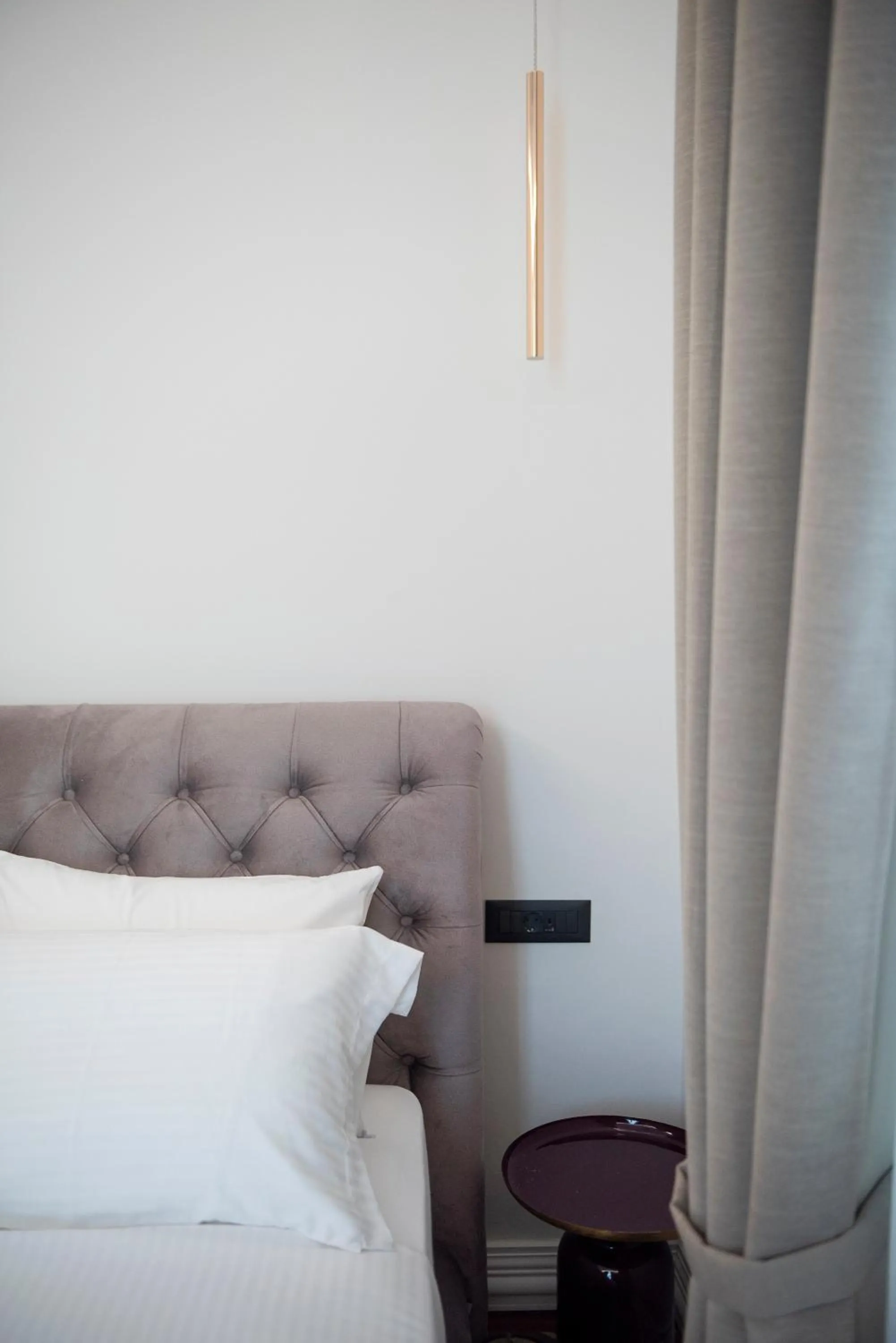 Bed in Jensen Luxury Suites