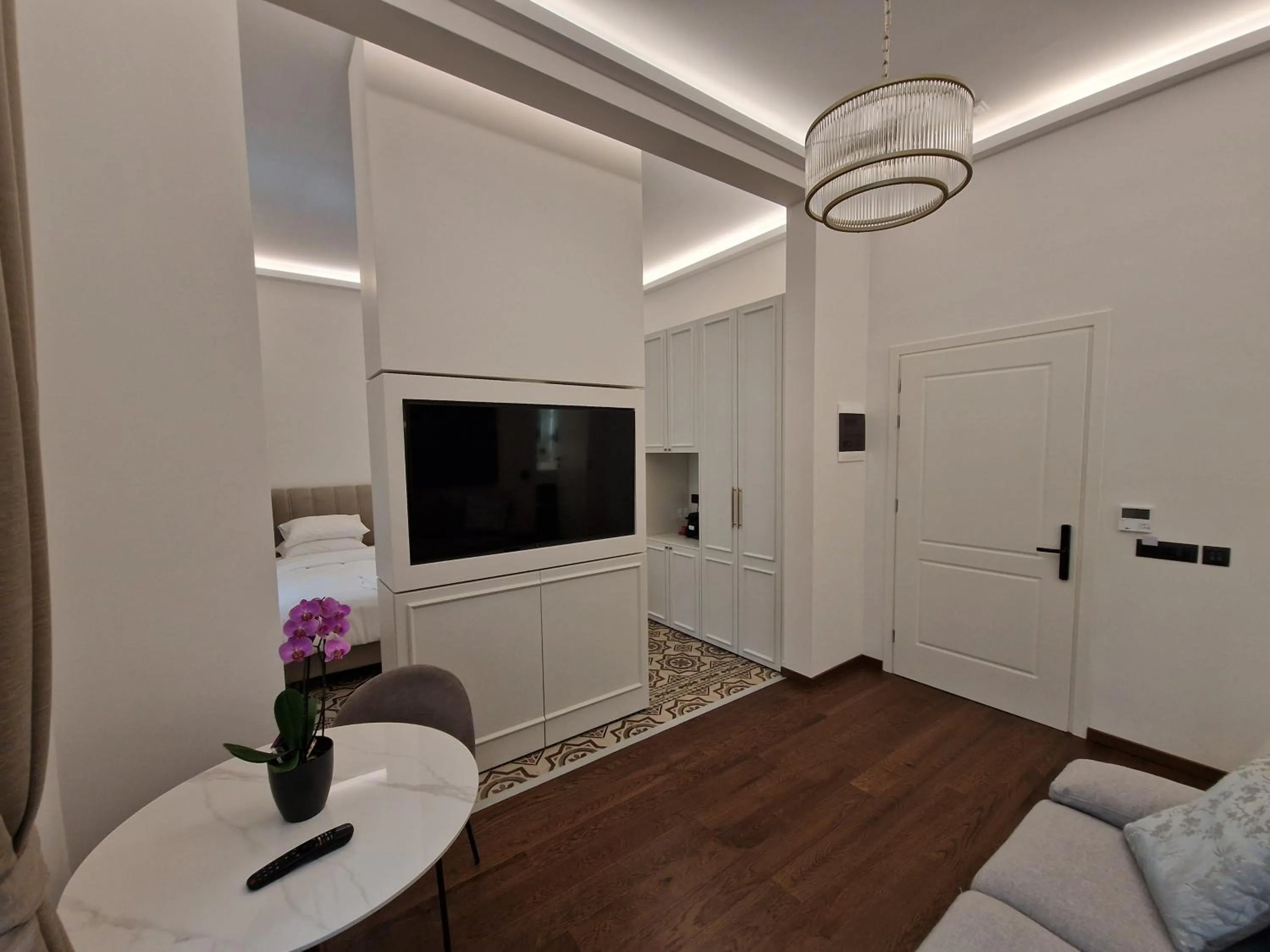 Bed in Jensen Luxury Suites