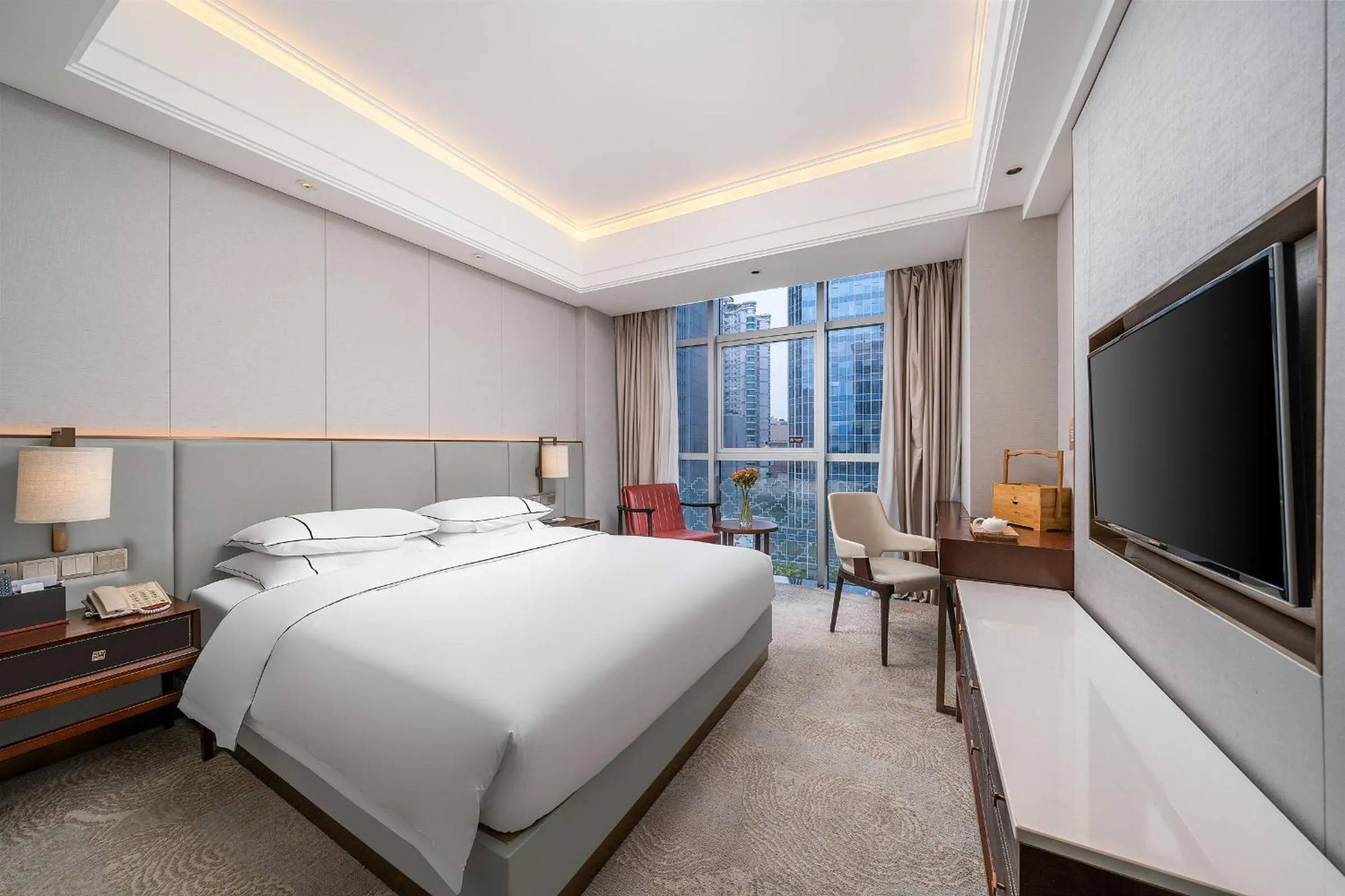 Communal lounge/ TV room, Bed in Echeng Hotel Guangzhou Zhujiang New Town