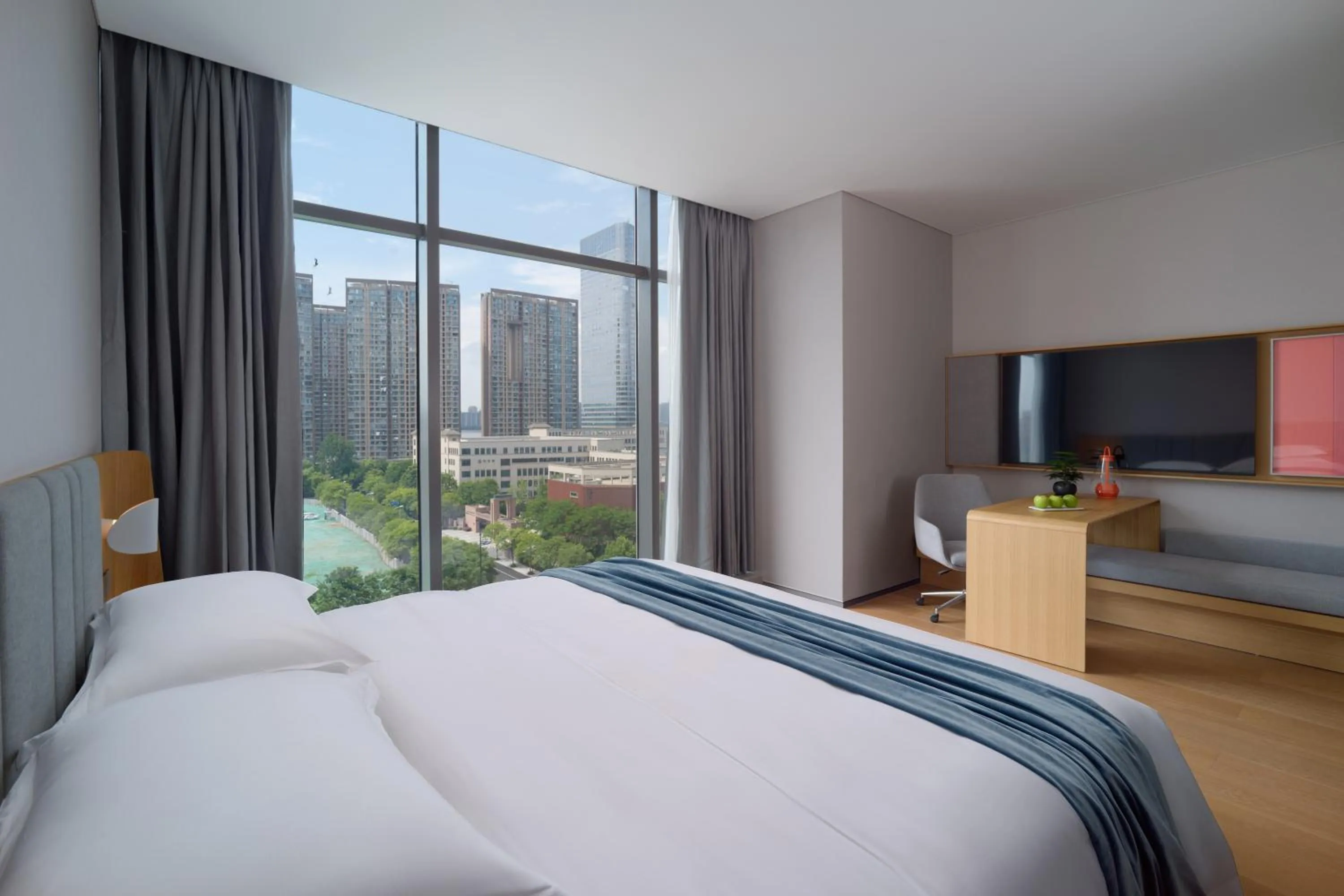 Bed in Pagoda Hotel Hangzhou Binjiang