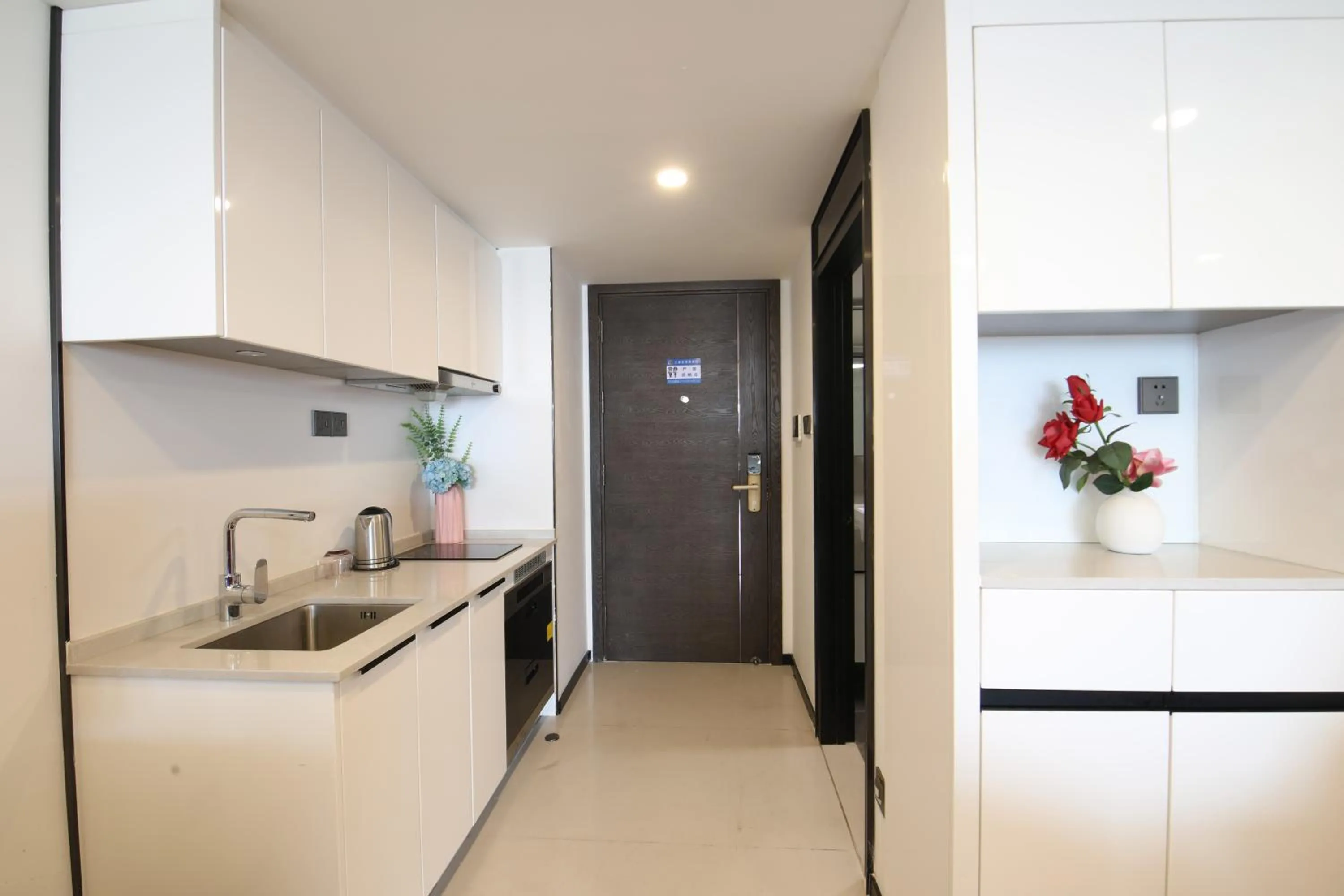 Kitchen or kitchenette in Xinghe Times Apartment - Shenzhen North Railway Station