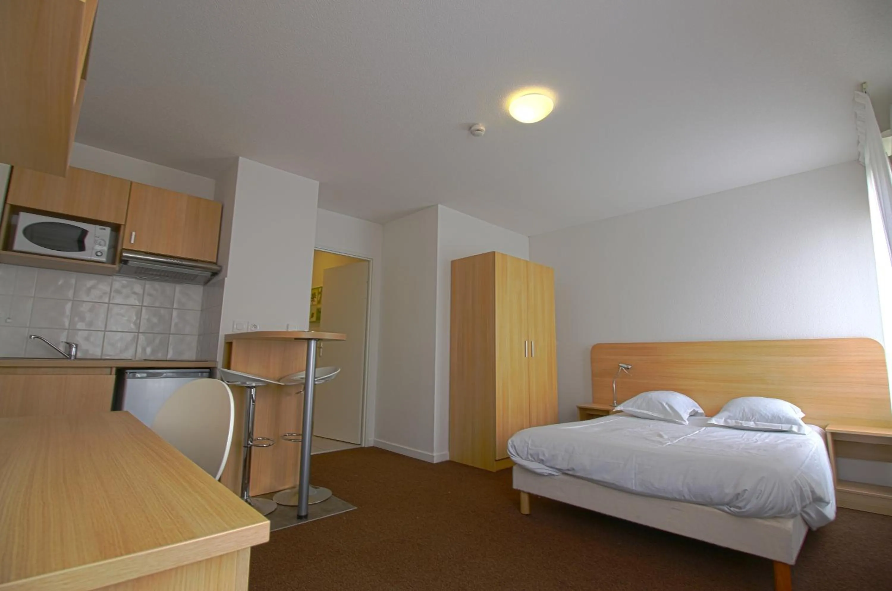 Photo of the whole room in Kosy Appart Hôtel Résidence Arboréa