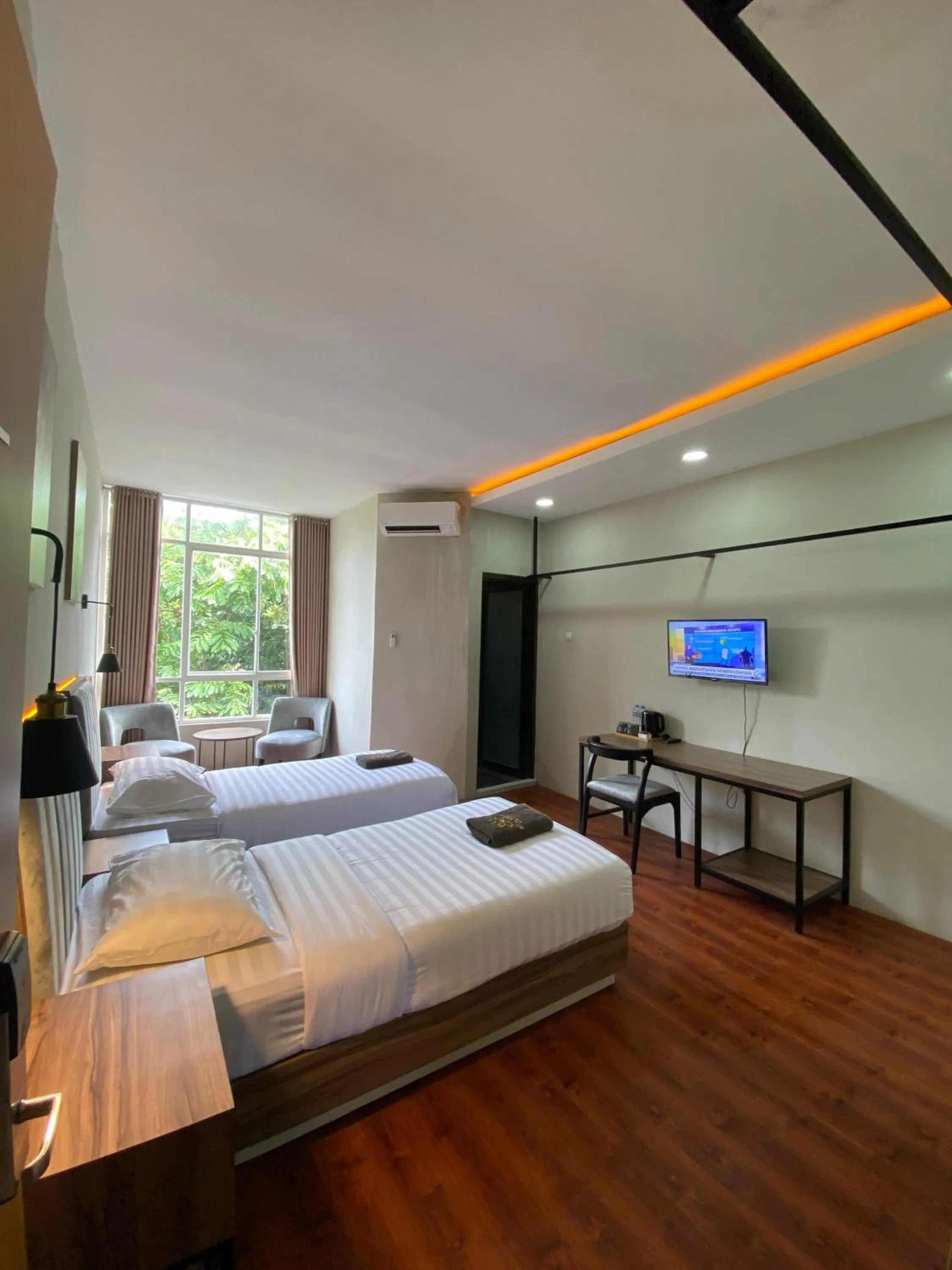 Bed in Royal Kencana Hotel powered by Cocotel