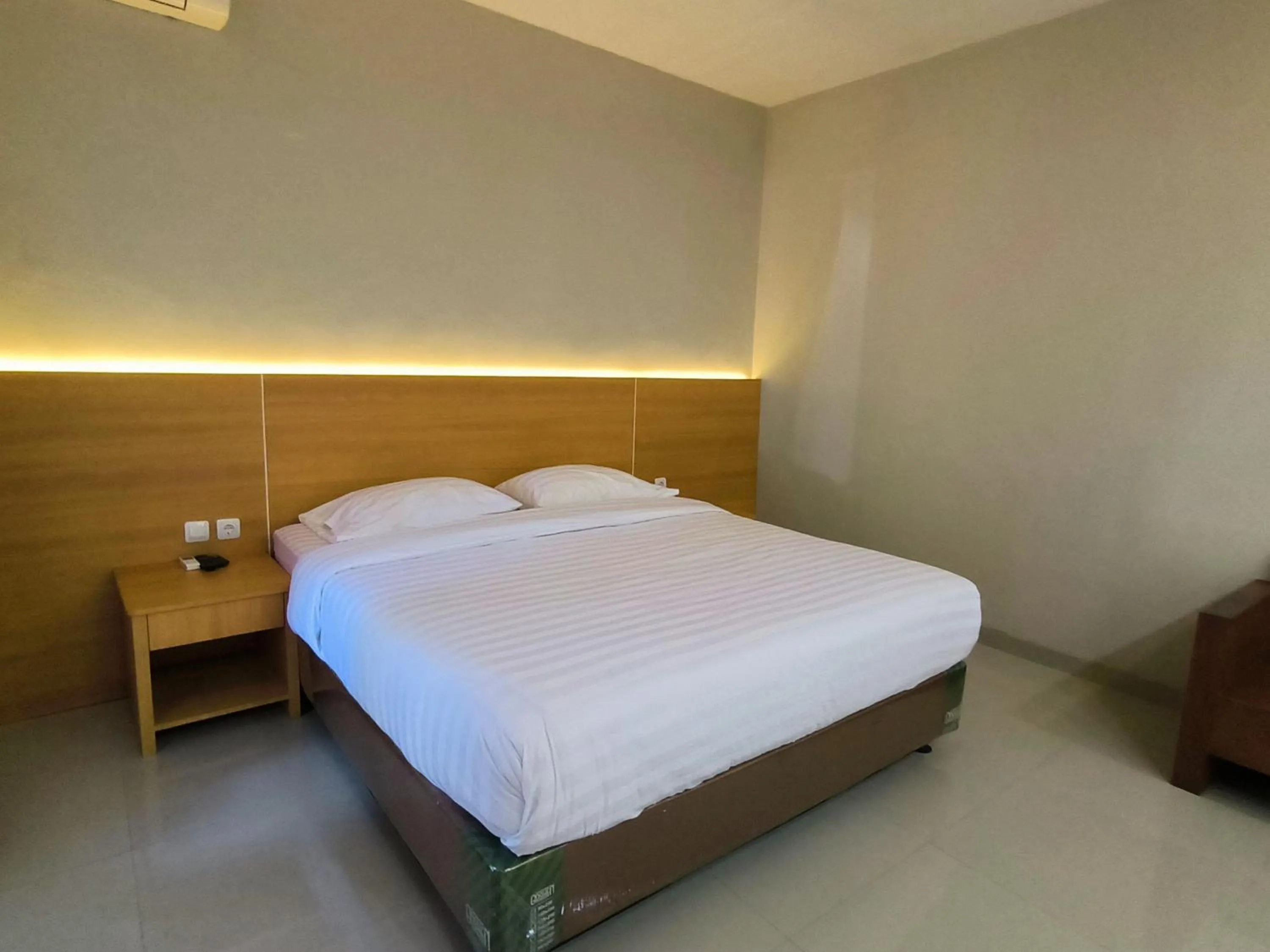 Bed in Royal Kencana Hotel powered by Cocotel