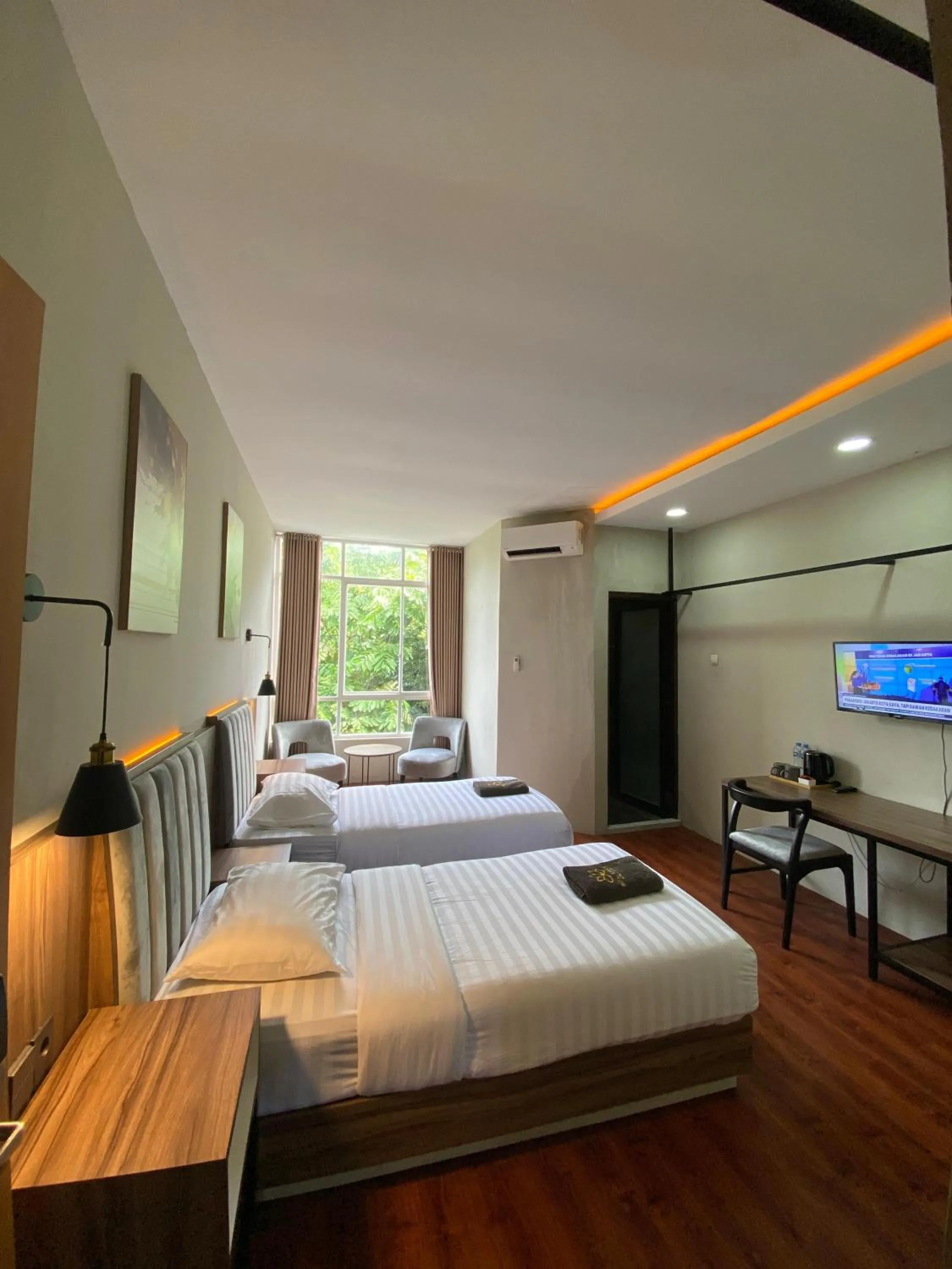 Bed in Royal Kencana Hotel powered by Cocotel