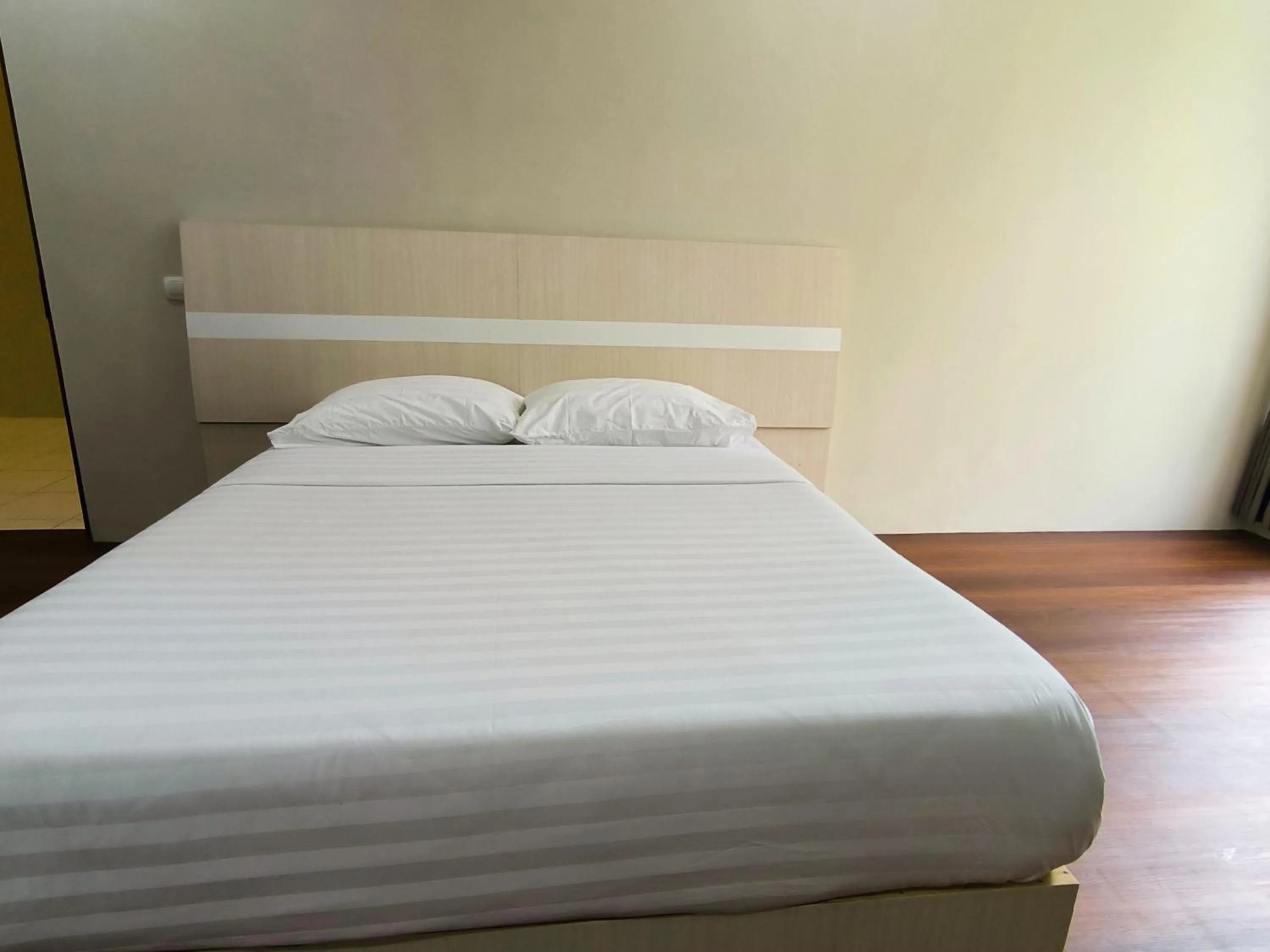 Bed in Royal Kencana Hotel powered by Cocotel