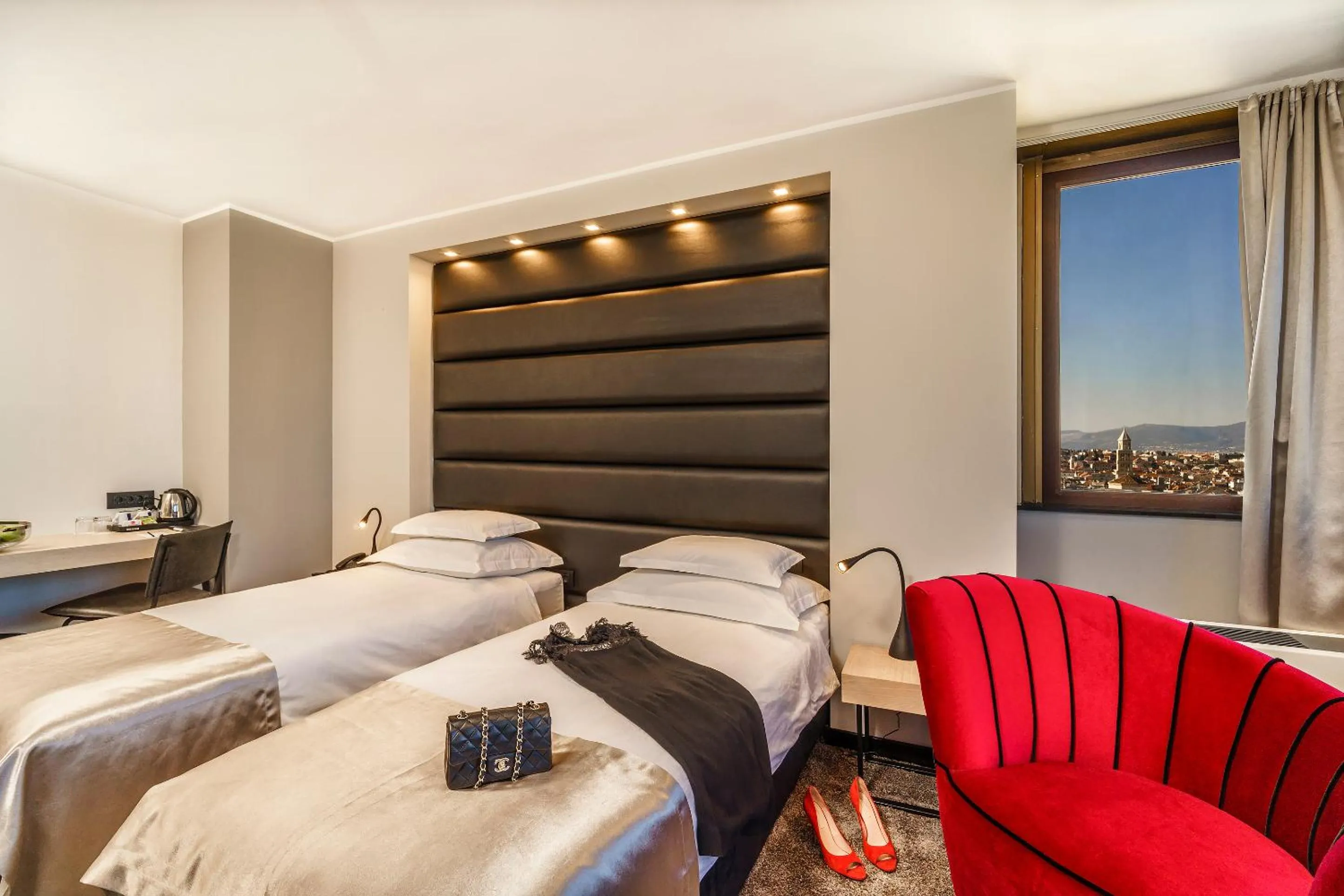 Seating area, Bed in The View Luxury Rooms