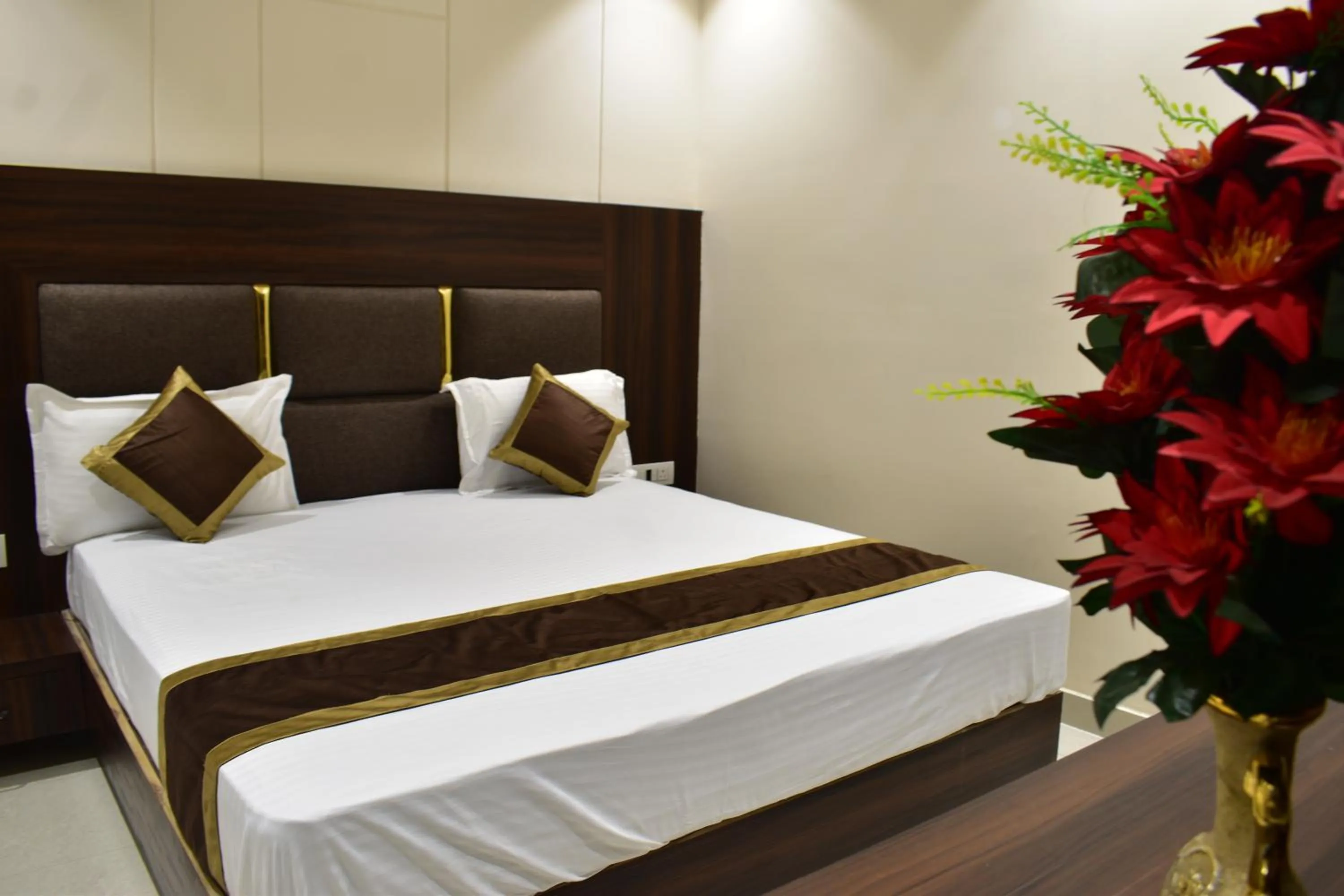 Bed in Hotel Kusum Palace