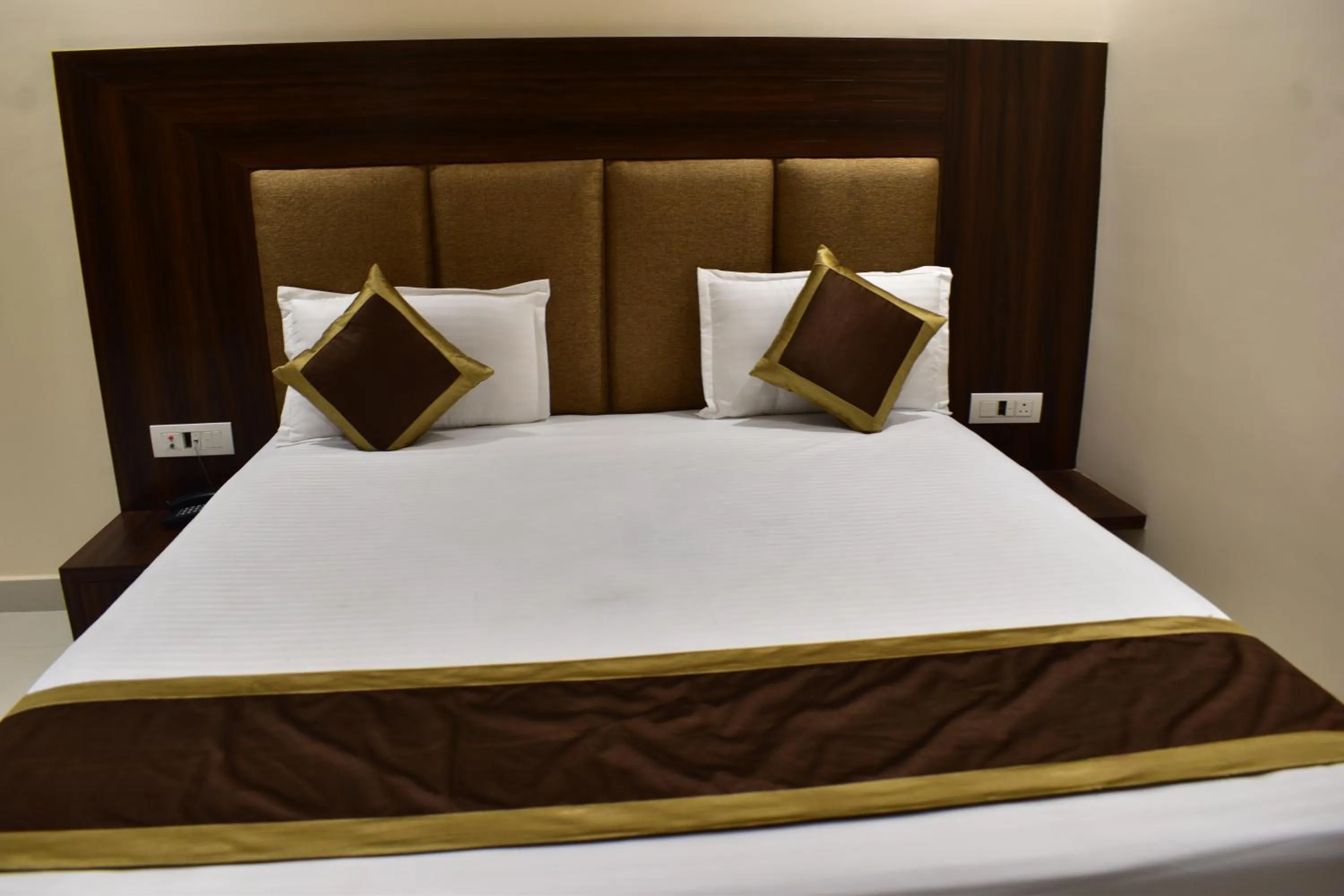 Bed in Hotel Kusum Palace