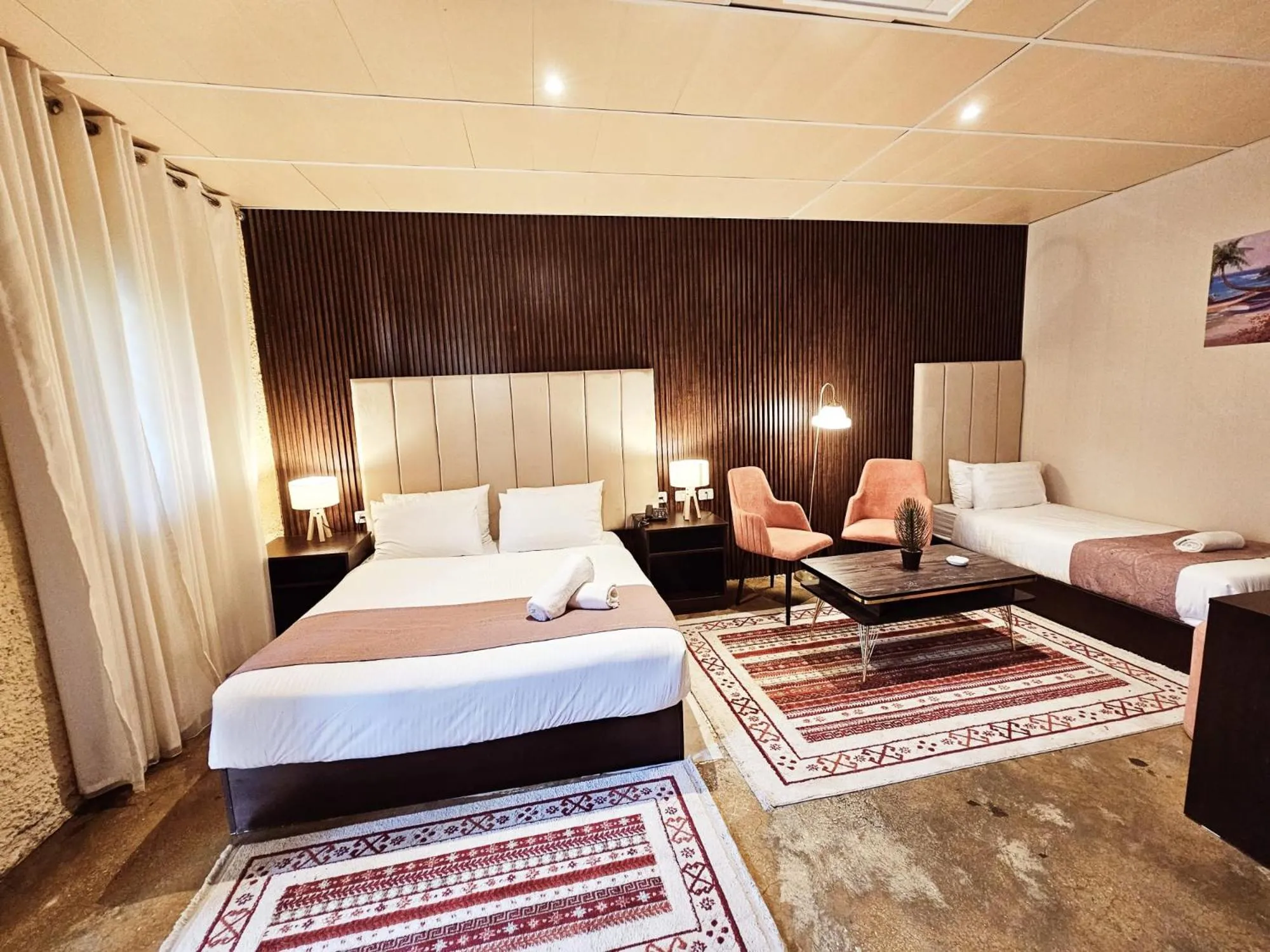 Bed in Qasr alnkheel resort and hotel