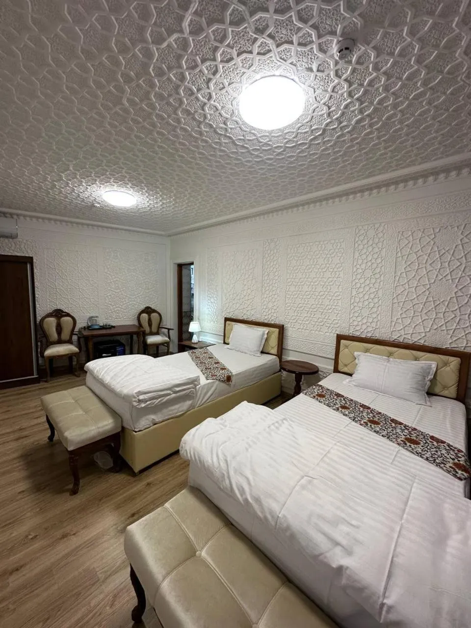 Photo of the whole room, Bed in AMIRAN Boutique