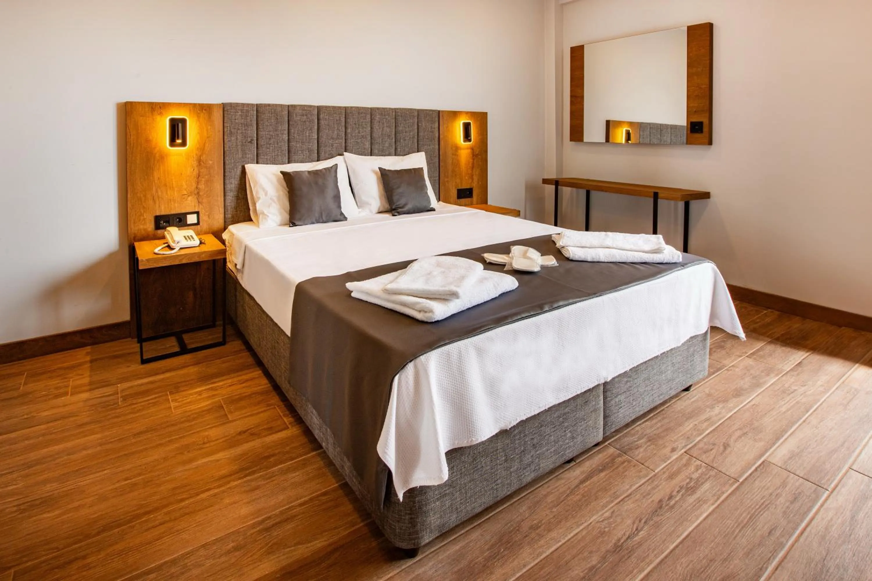 Bed in Grand Business Hotel