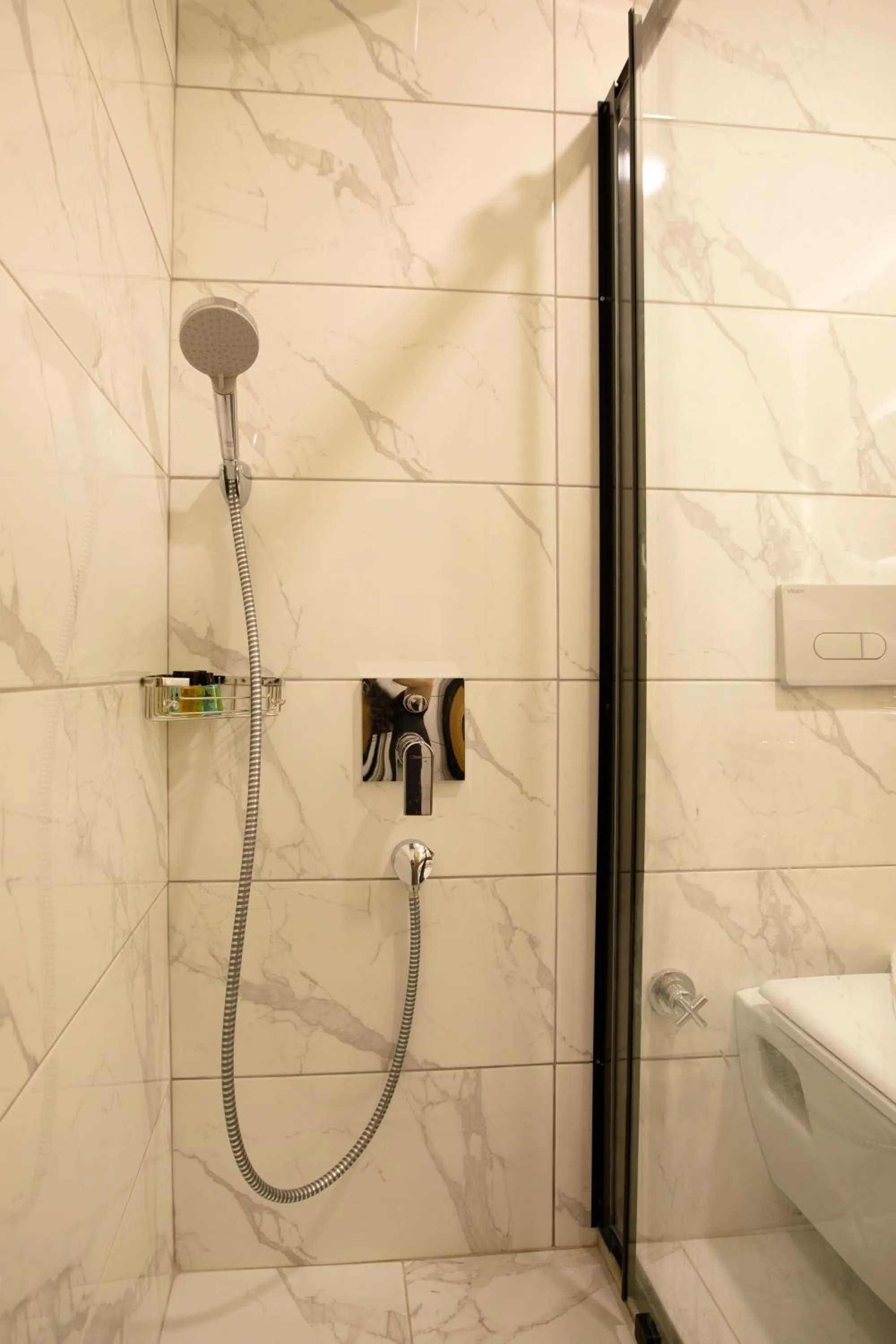 Shower in Grand Business Hotel