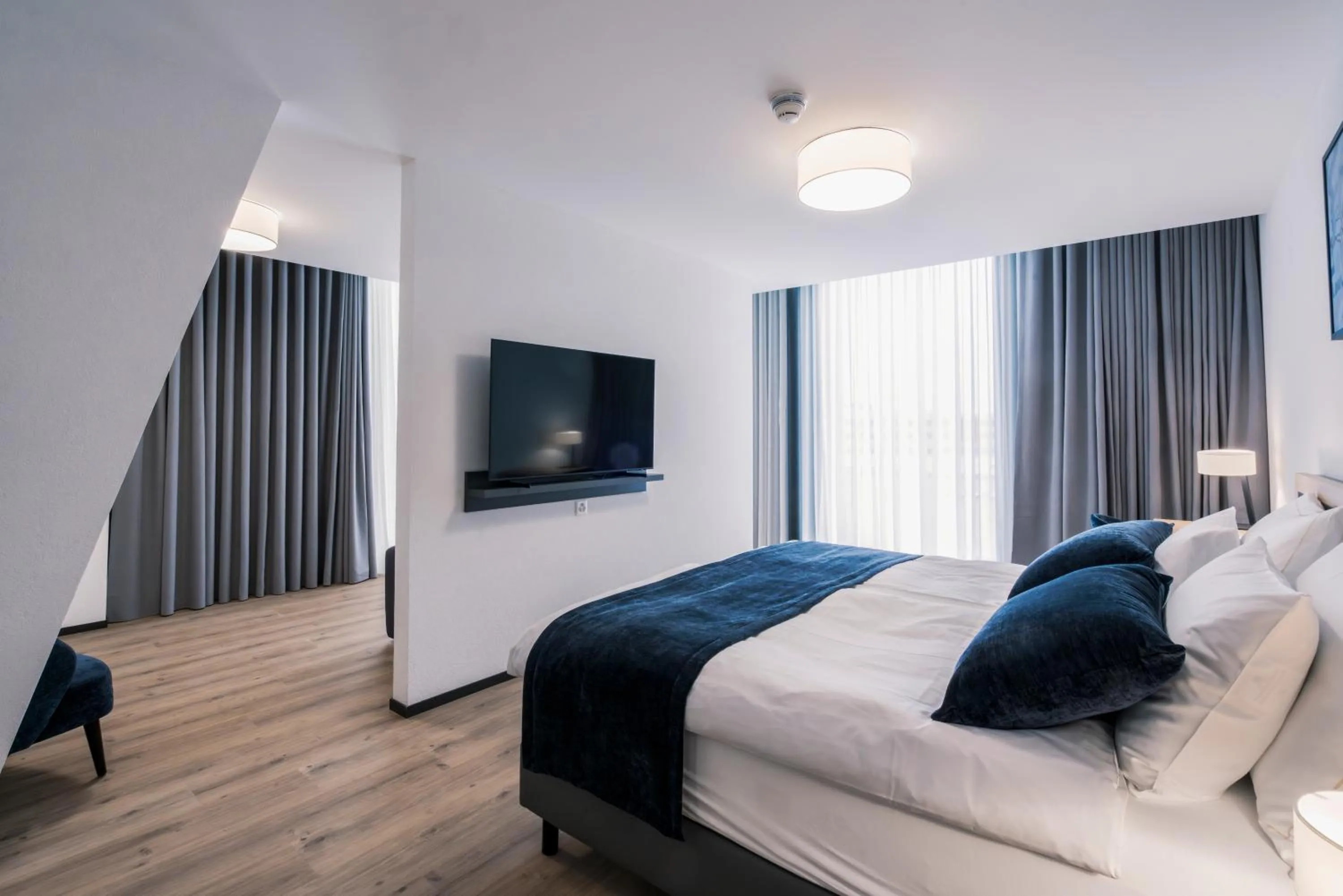 Photo of the whole room, Bed in YParc Hôtel