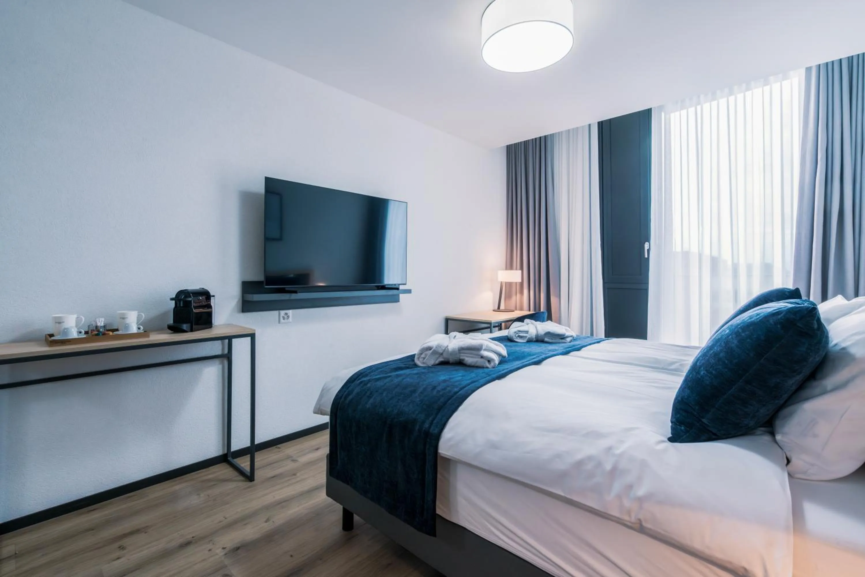 TV and multimedia, Bed in YParc Hôtel