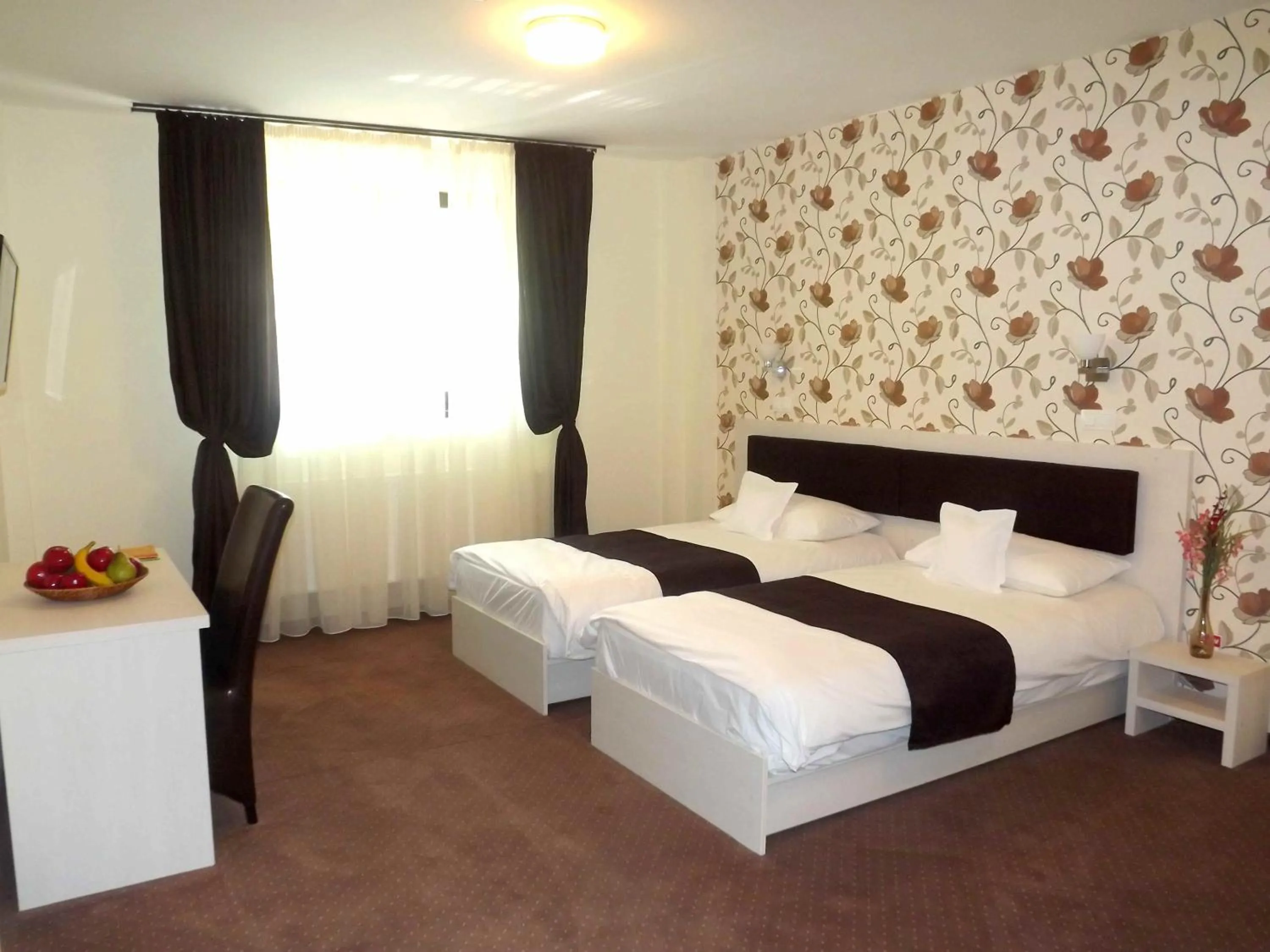 Bed in West Plaza Residence