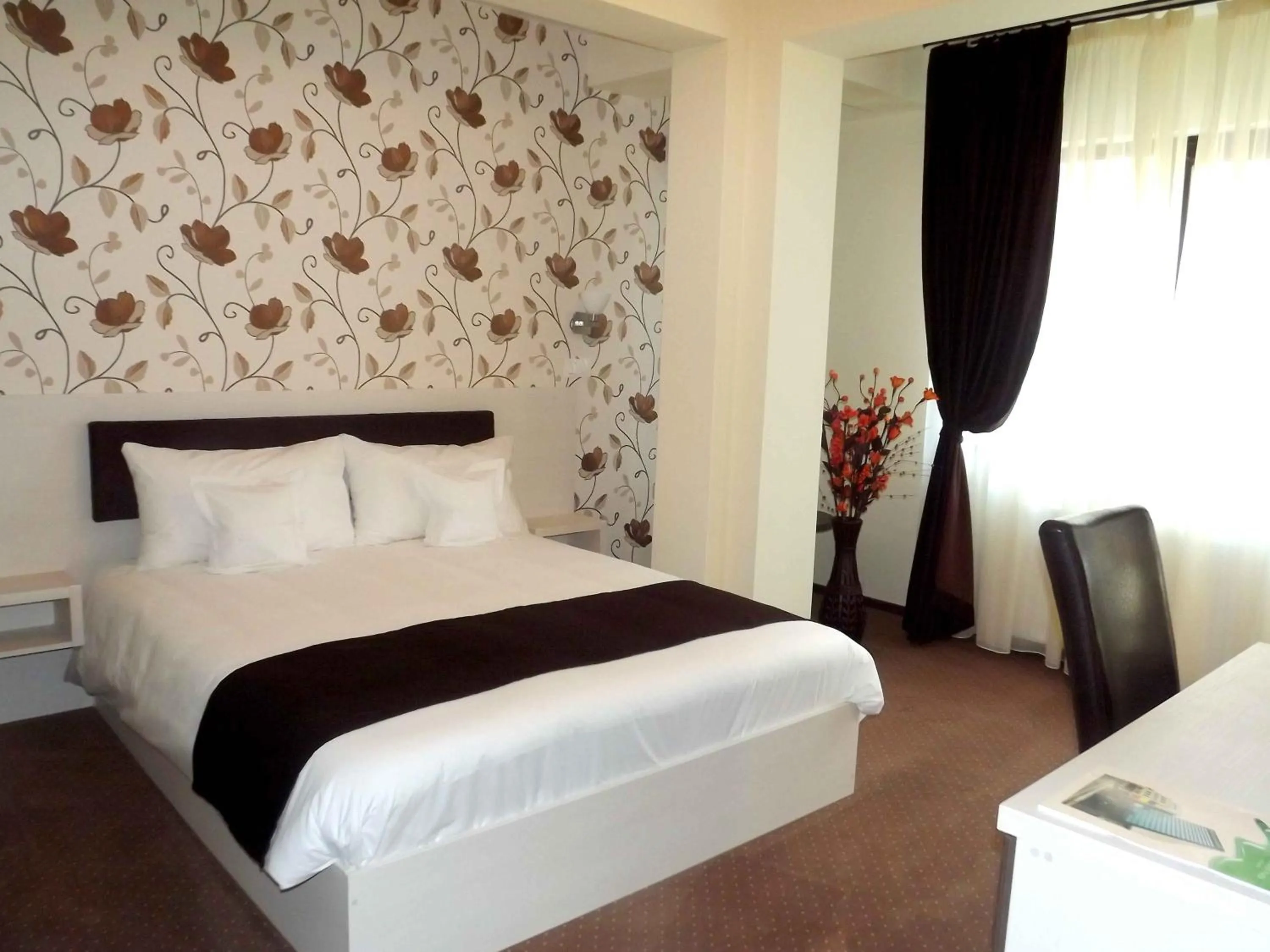 Photo of the whole room, Bed in West Plaza Residence