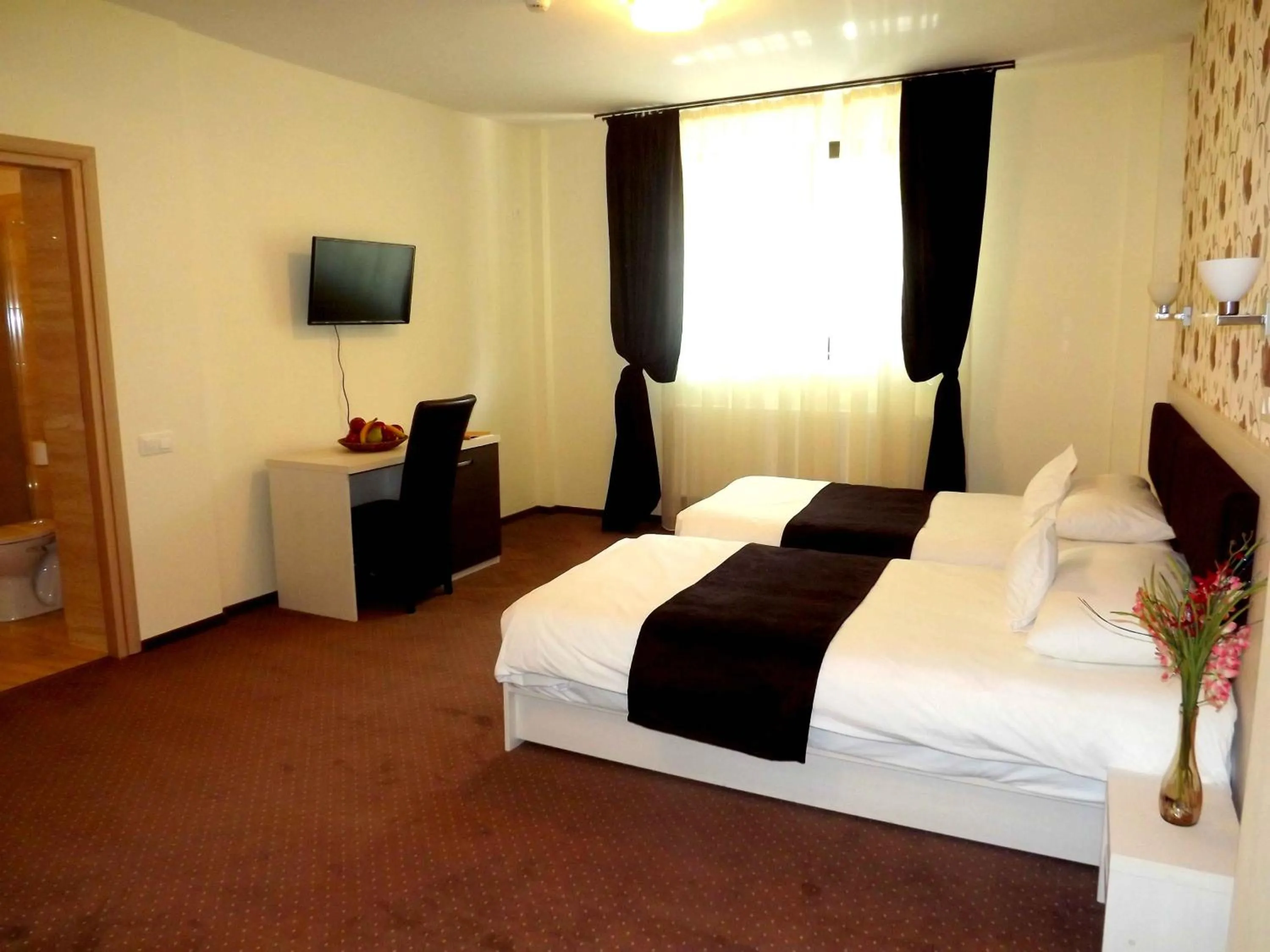 Photo of the whole room, Bed in West Plaza Residence