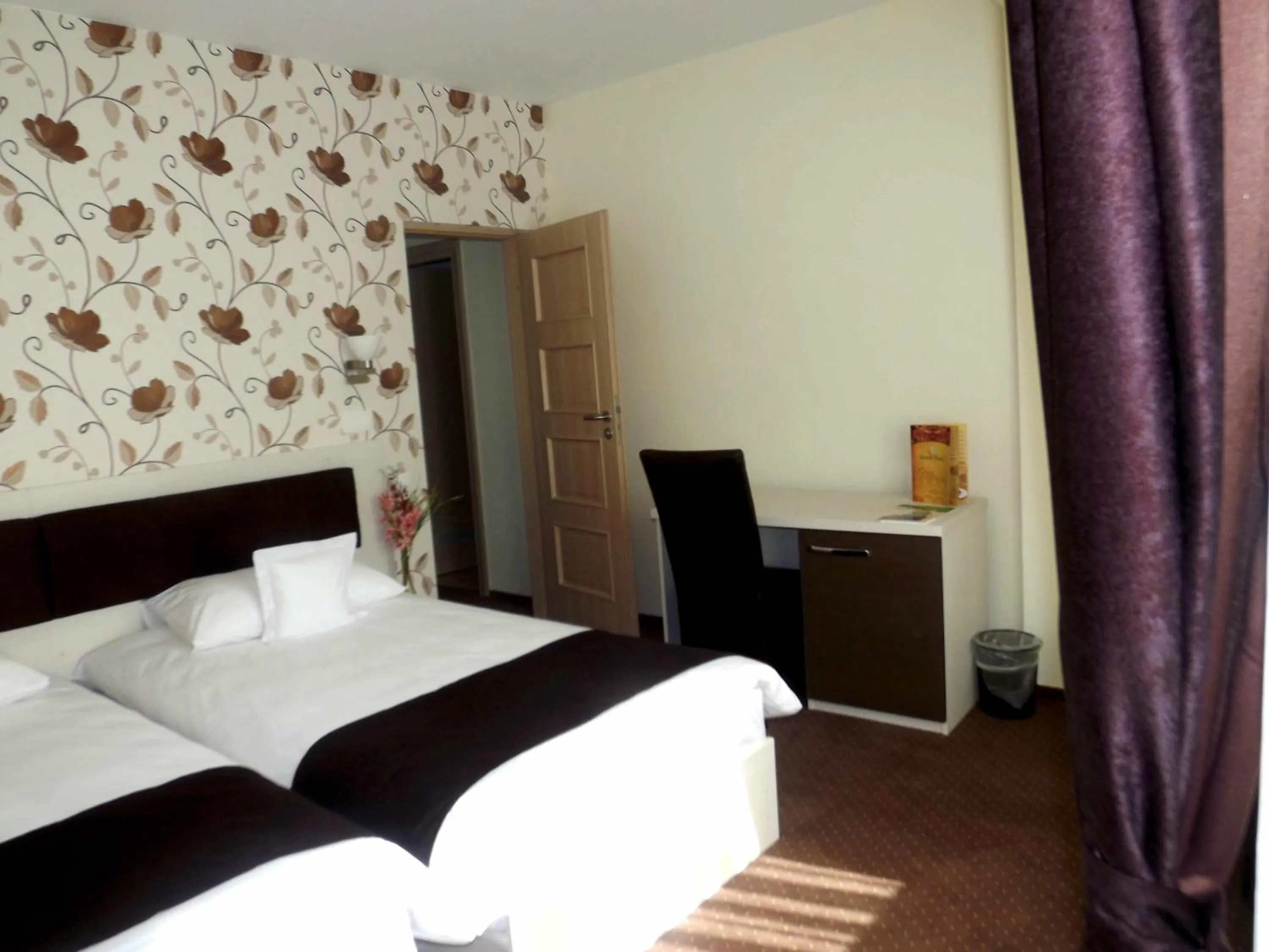 Living room, Bed in West Plaza Residence