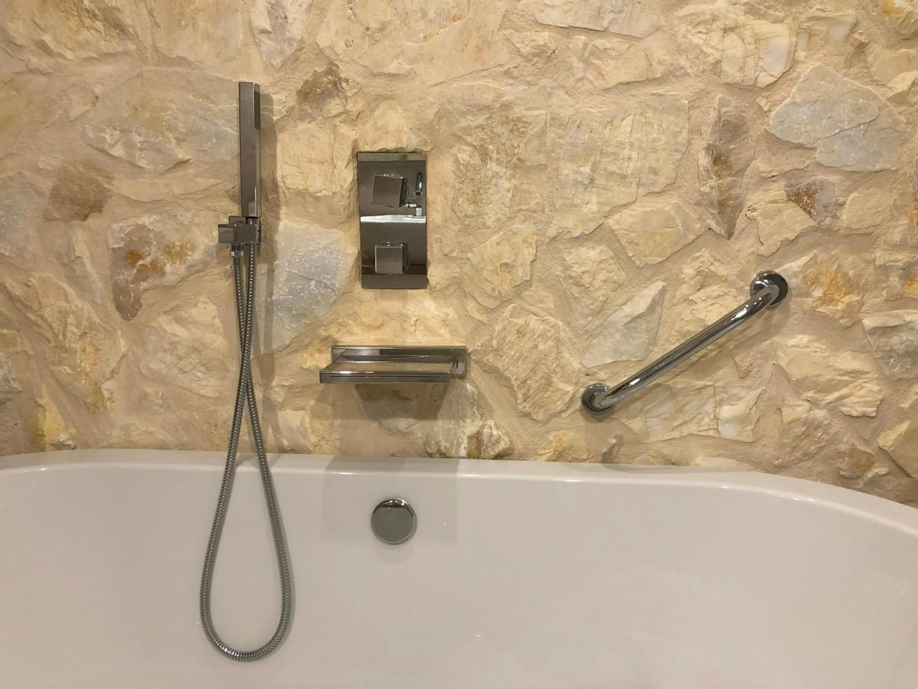 Bath in Komody Apartments