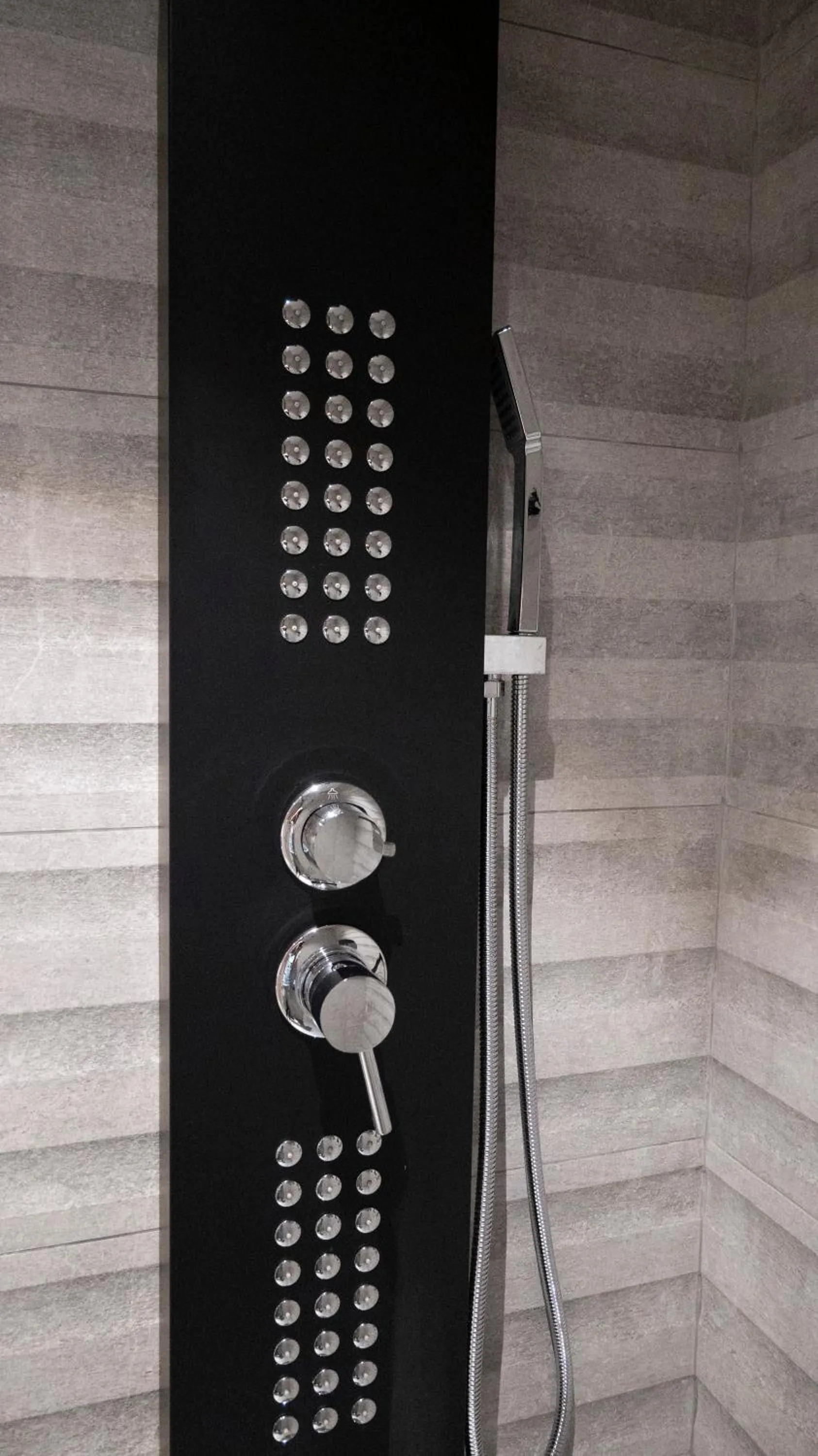 Shower in Komody Apartments