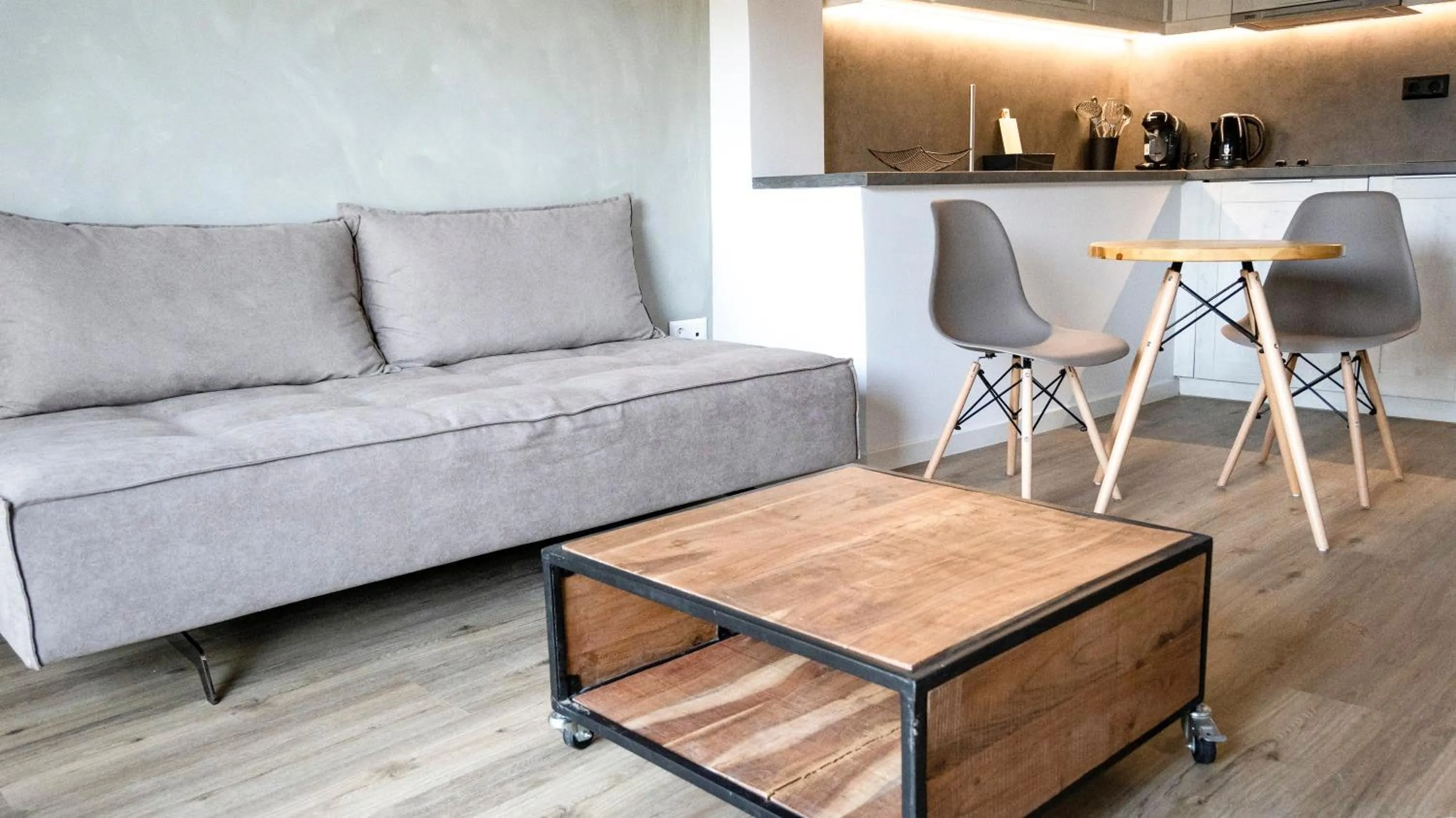 Seating area in Komody Apartments