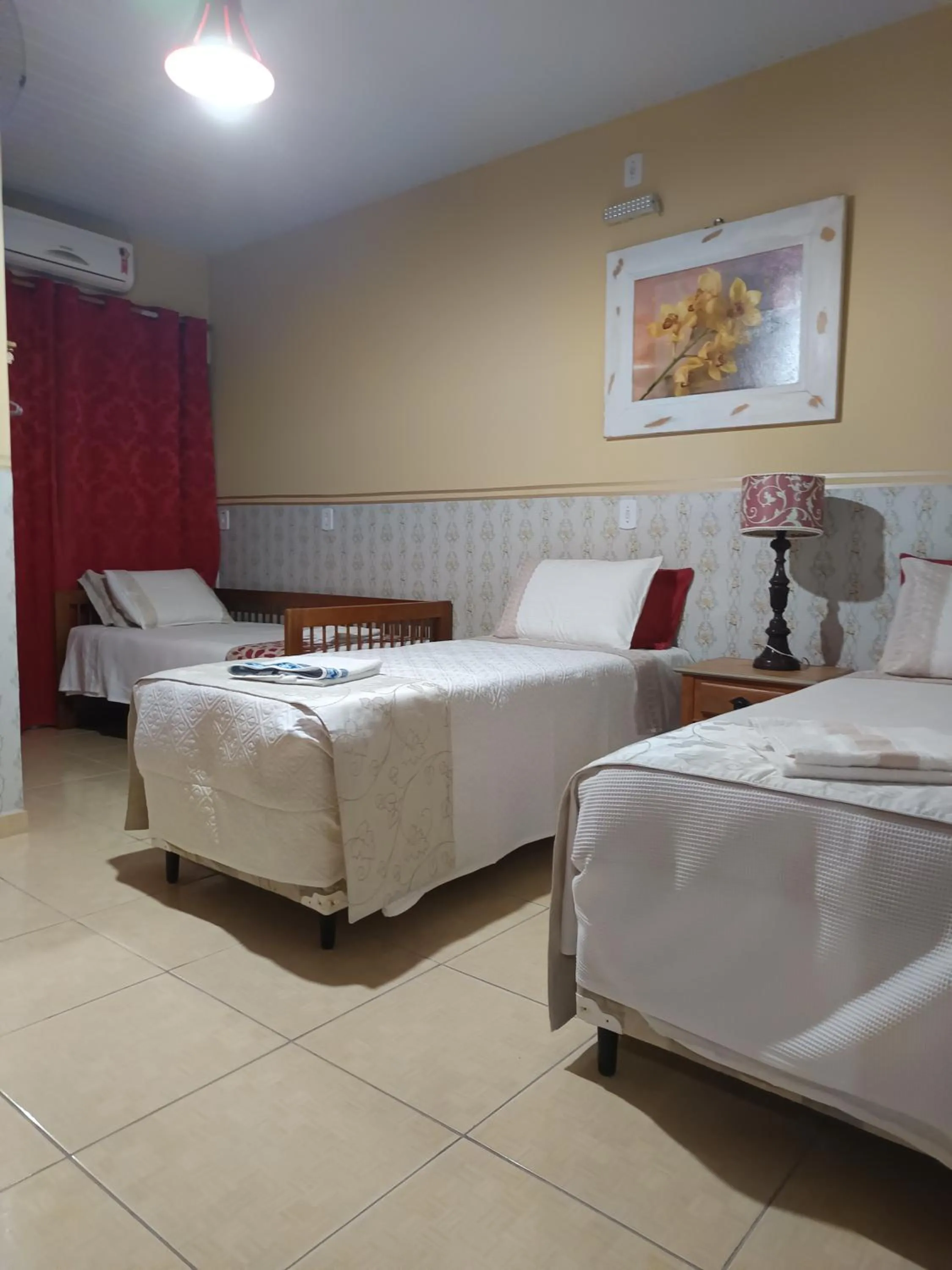 Bed in Pousada São João Batista