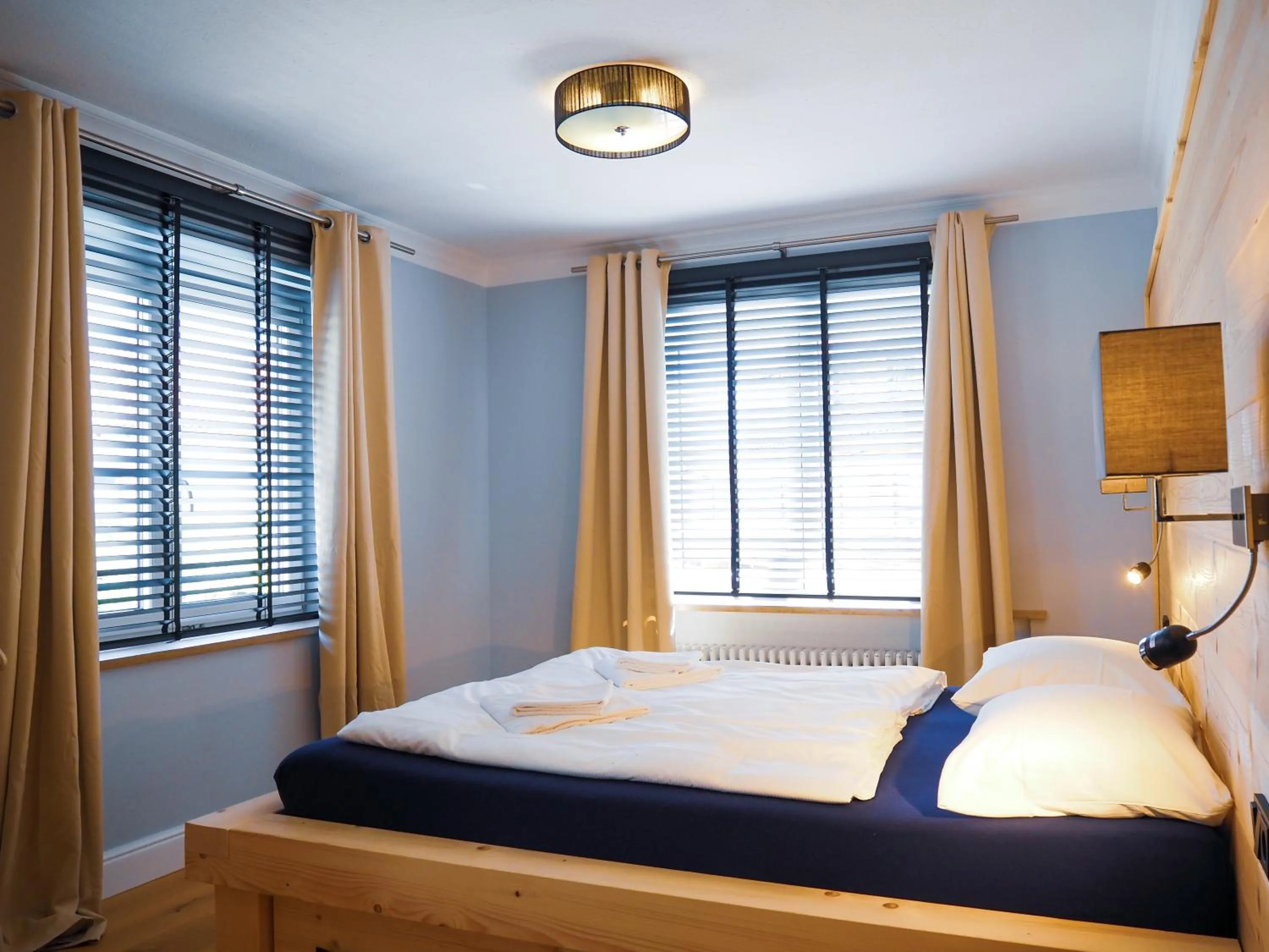 Bedroom, Bed in Design Hotel ALPENLIEBE - - - - Boutique-Flair - - - -