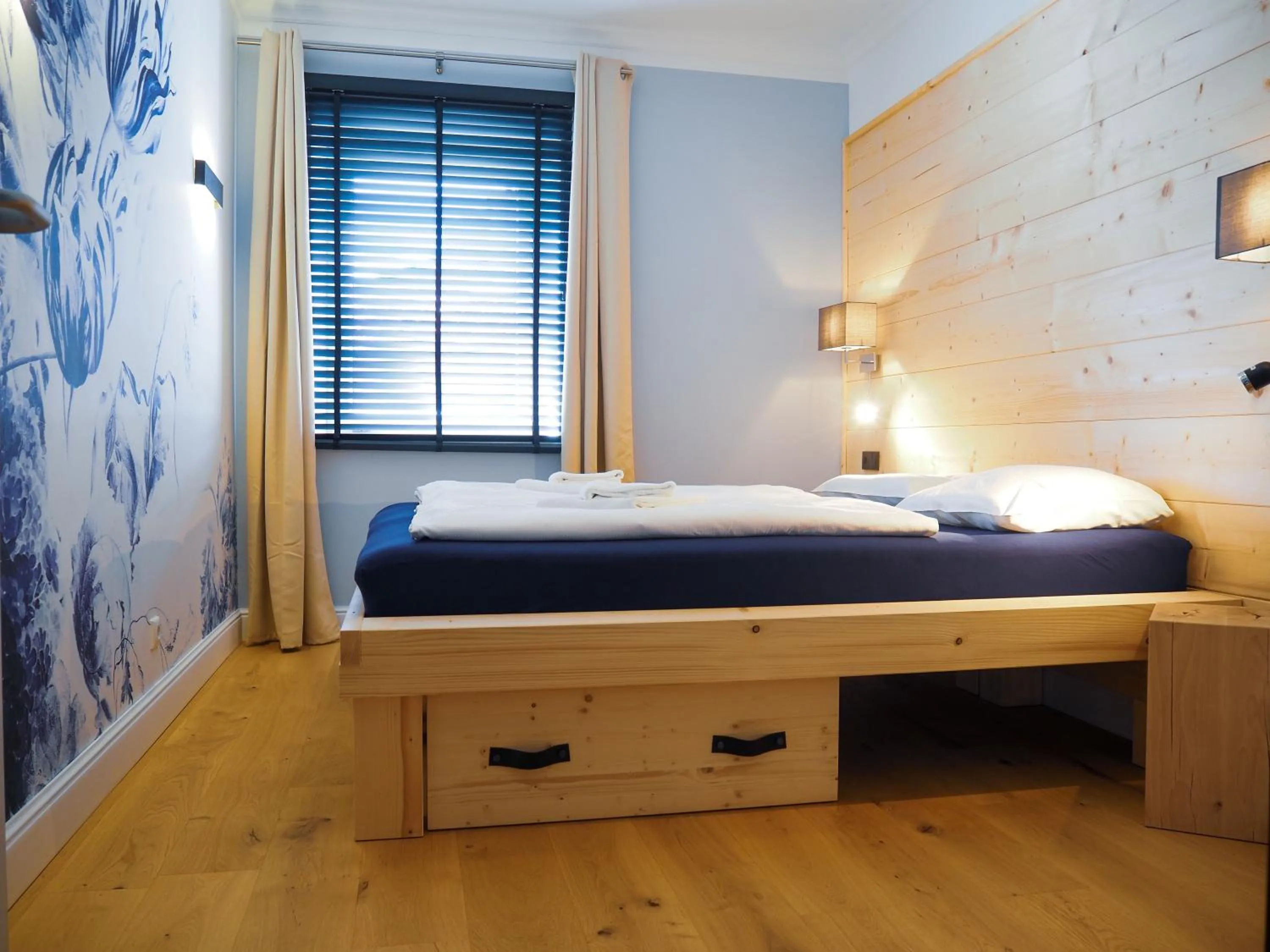 Bedroom, Bed in Design Hotel ALPENLIEBE - - - - Boutique-Flair - - - -
