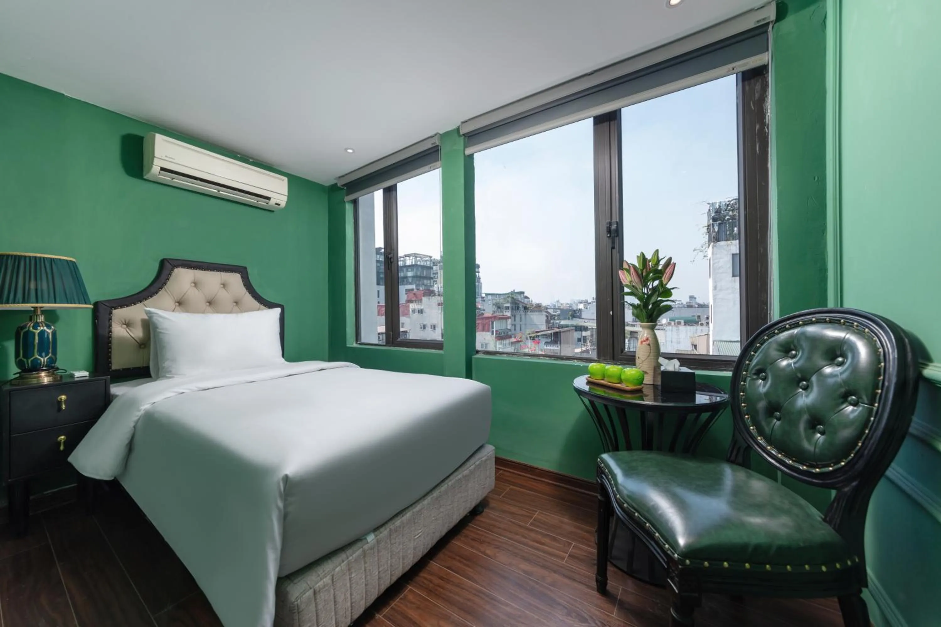 Bed in Madelise Adora Hotel & Travel