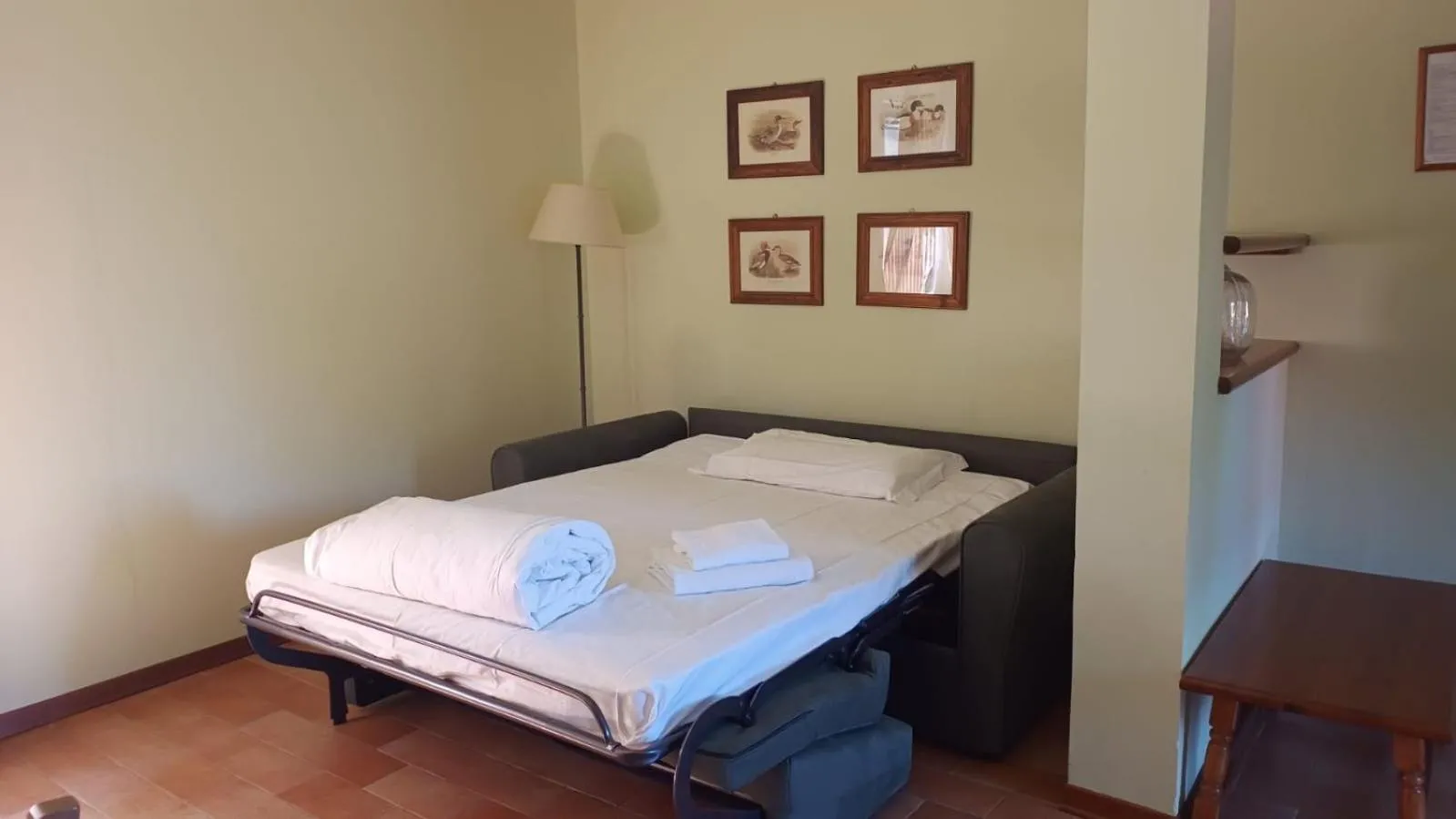Living room, Bed in Agriturismo Isola Augusta
