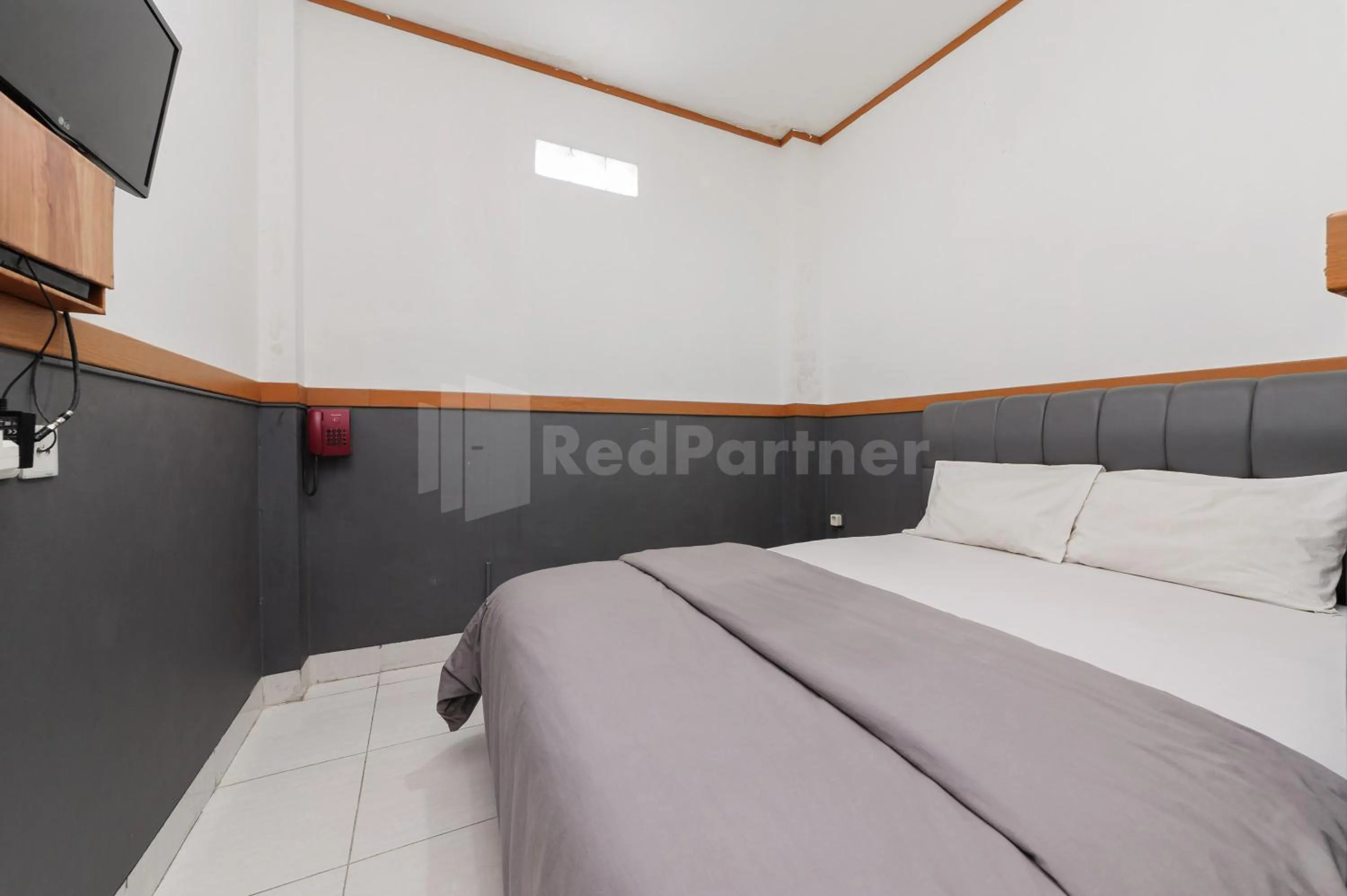 Bedroom, Bed in Urbanview Hotel Ian Jaksa Kebon Sirih
