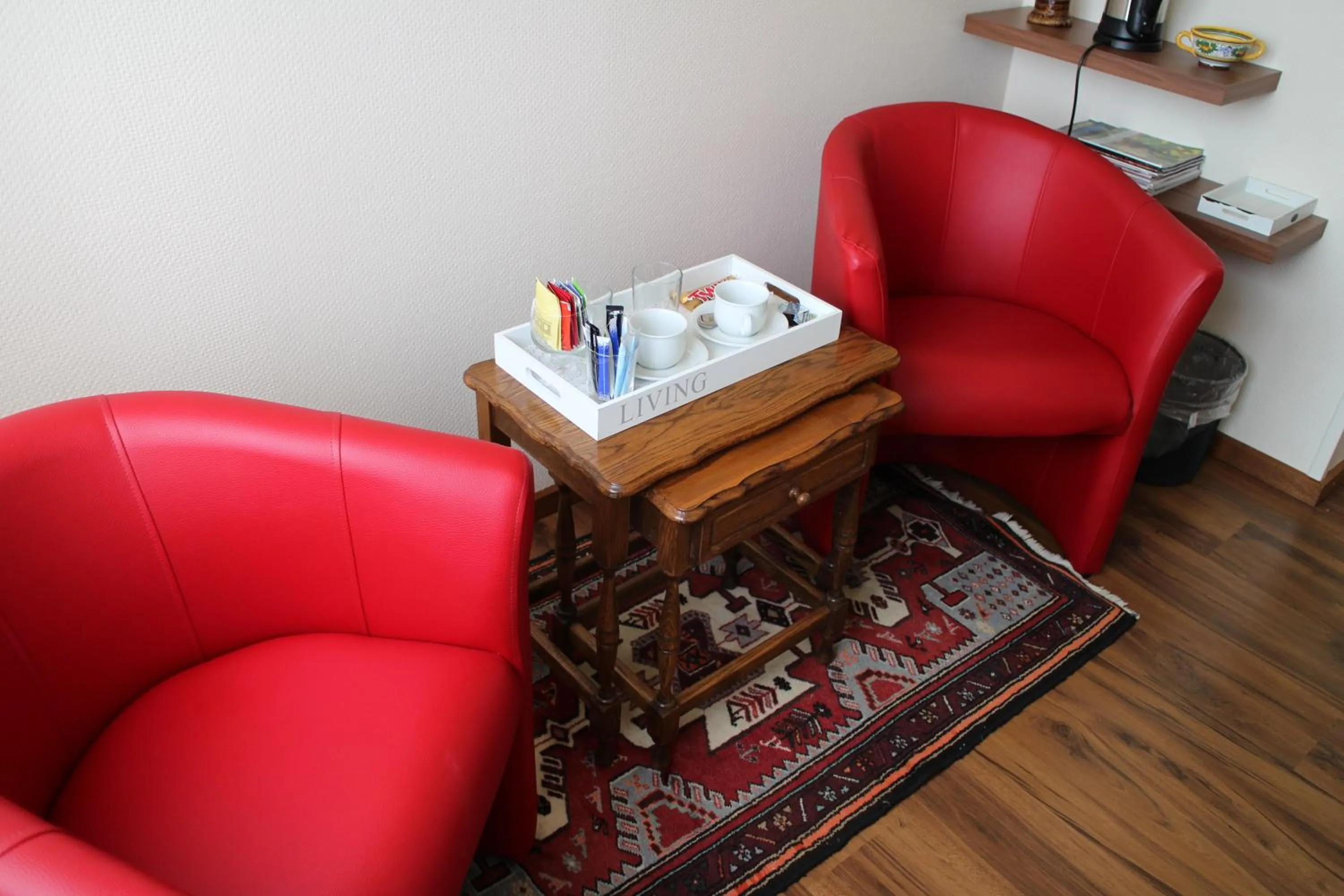 Seating area in Les Petites Chambres de la Bleue Maison